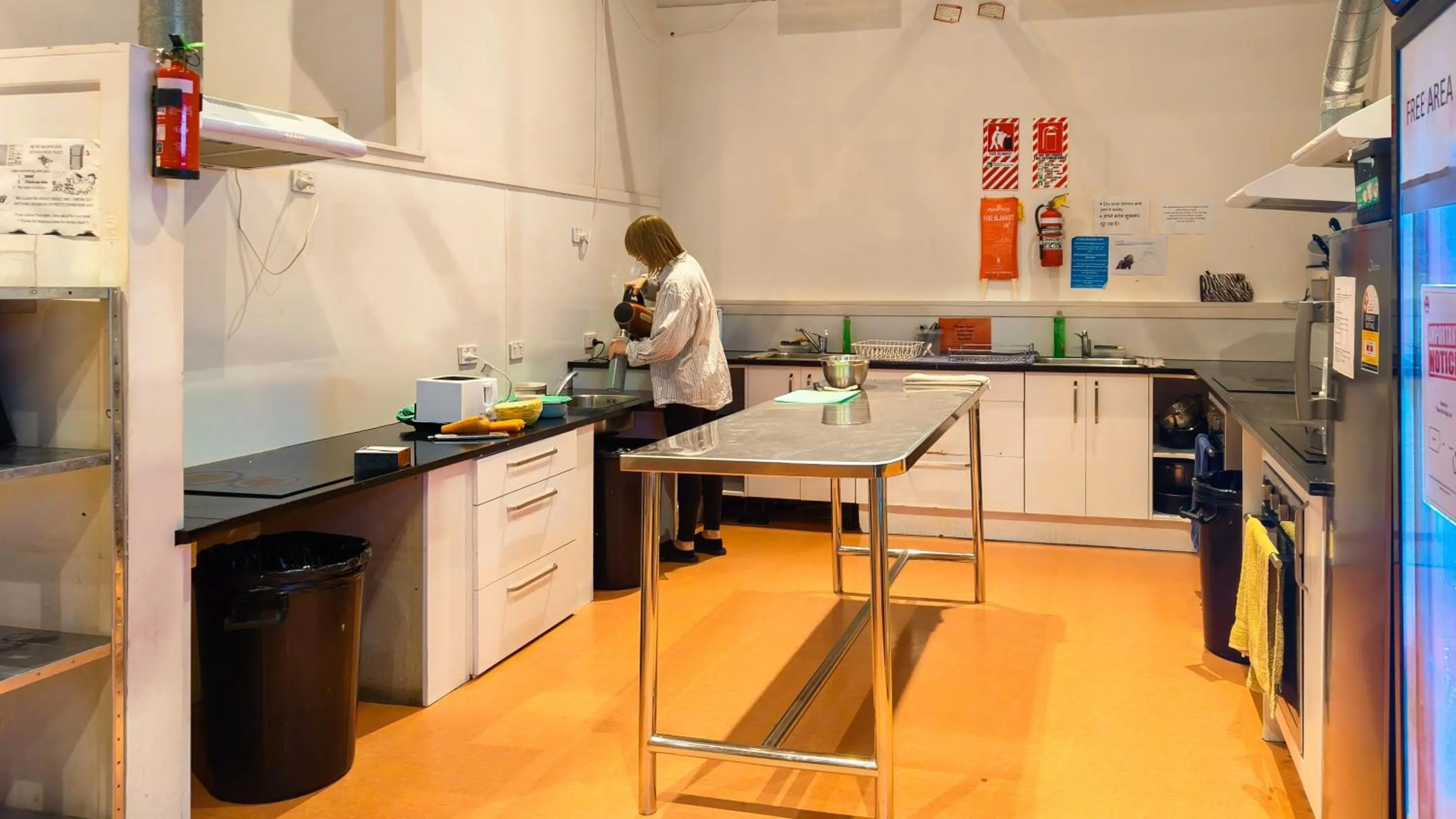 Communal kitchen in Metro Adventurer Backpackers