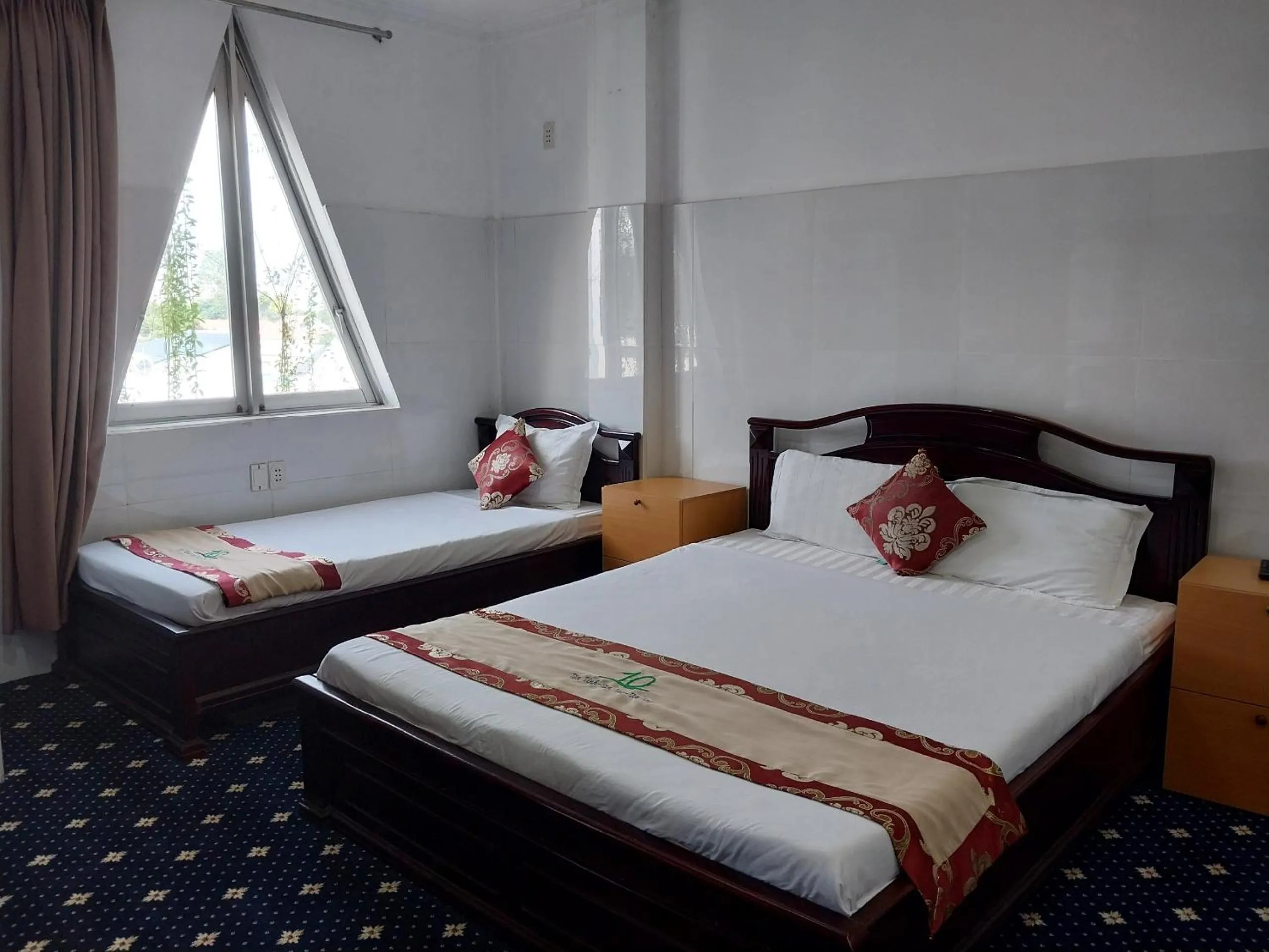 Bed in Nhat Quy Hotel