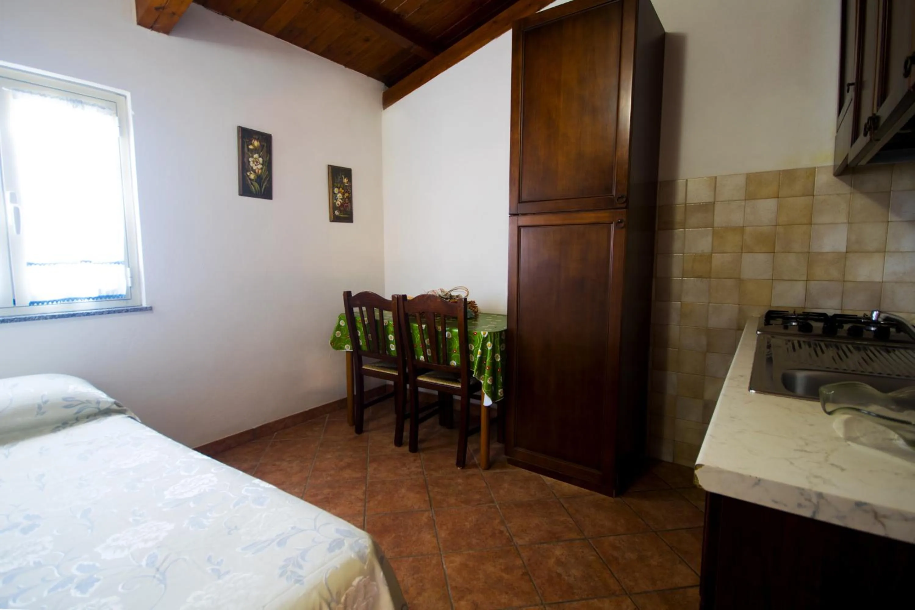 Kitchen or kitchenette, Bed in Park Oasi Resort