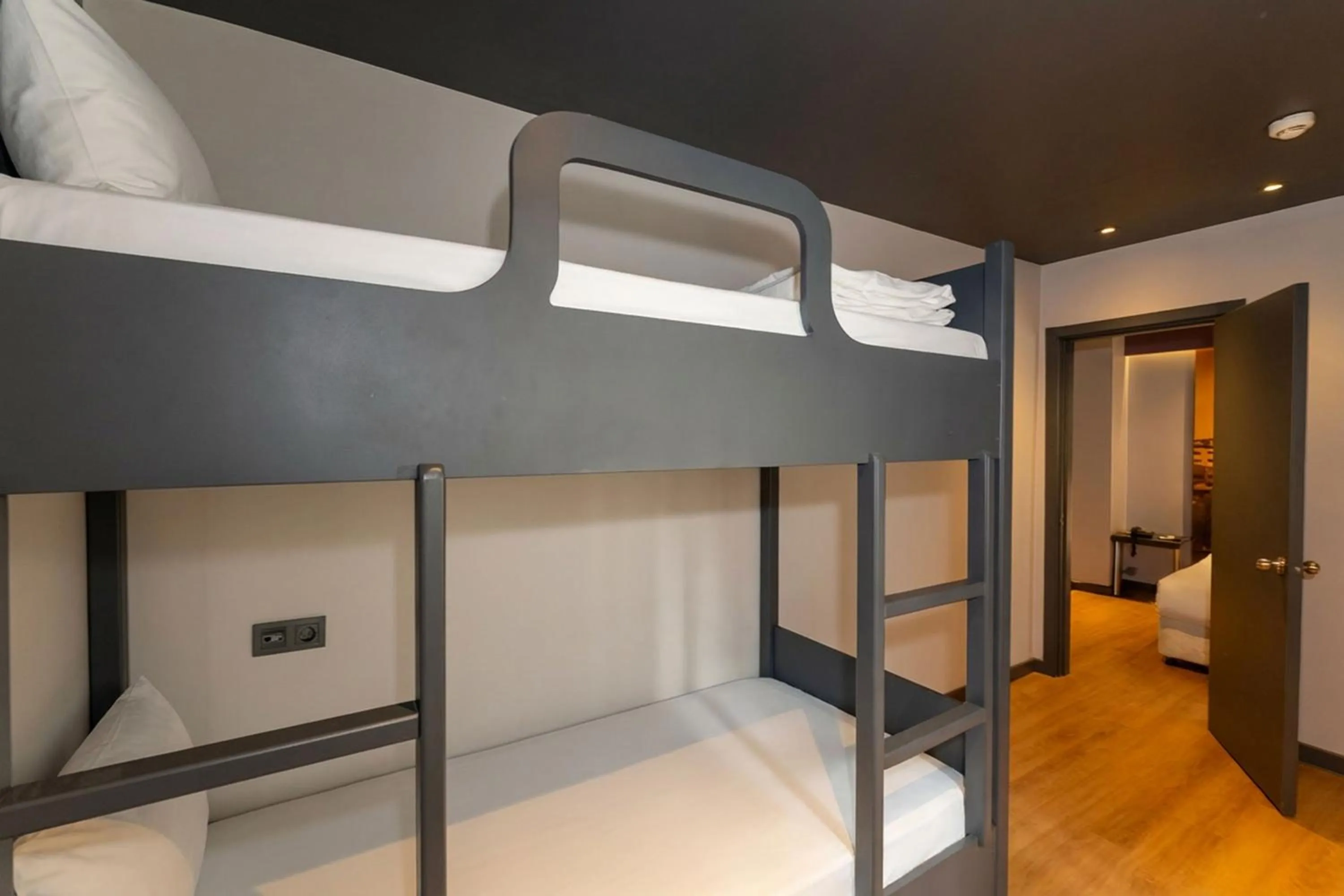 bunk bed, Bed in Tulip City Hotel & Spa