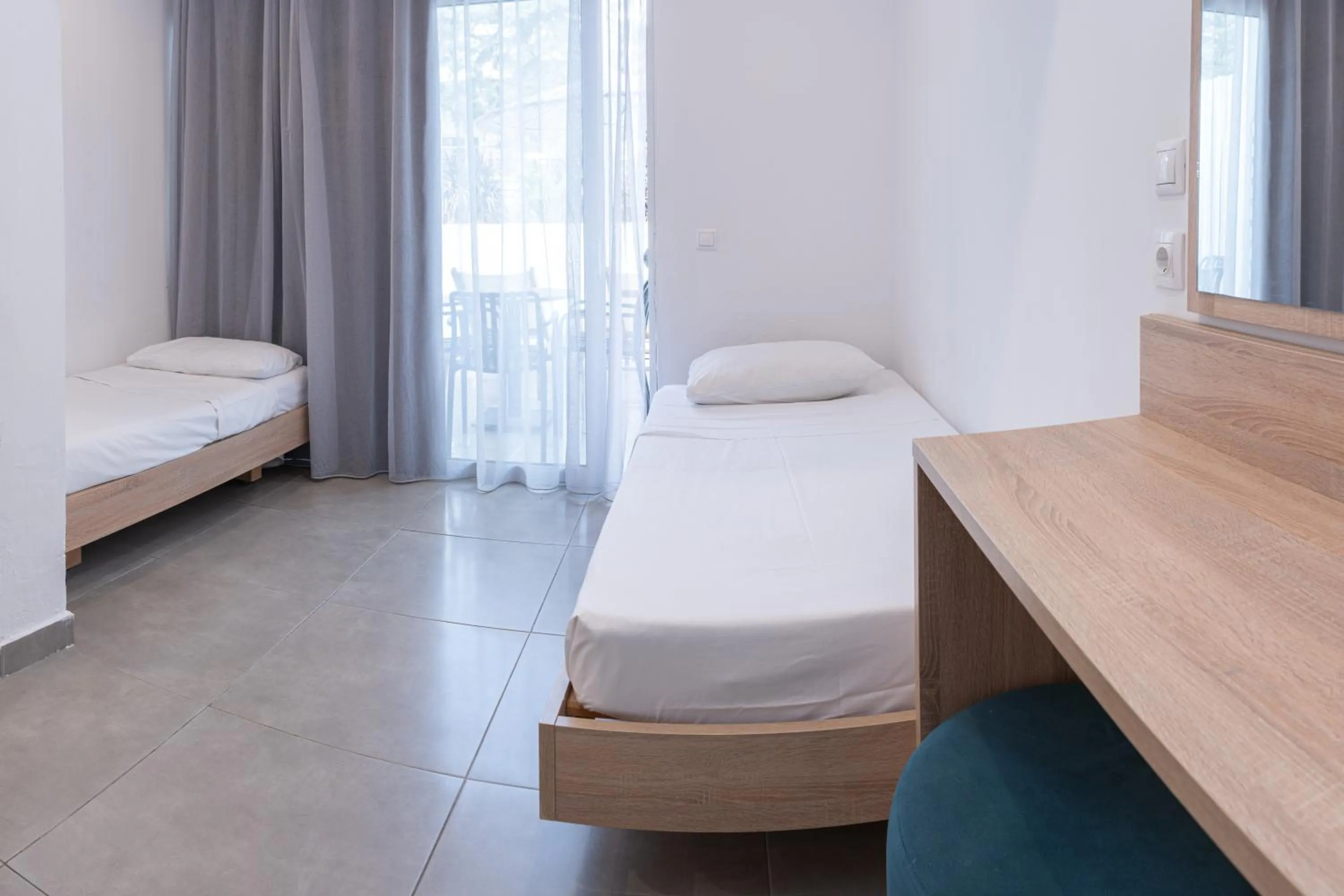 Bedroom, Bed in Delfinia Resort - All Inclusive