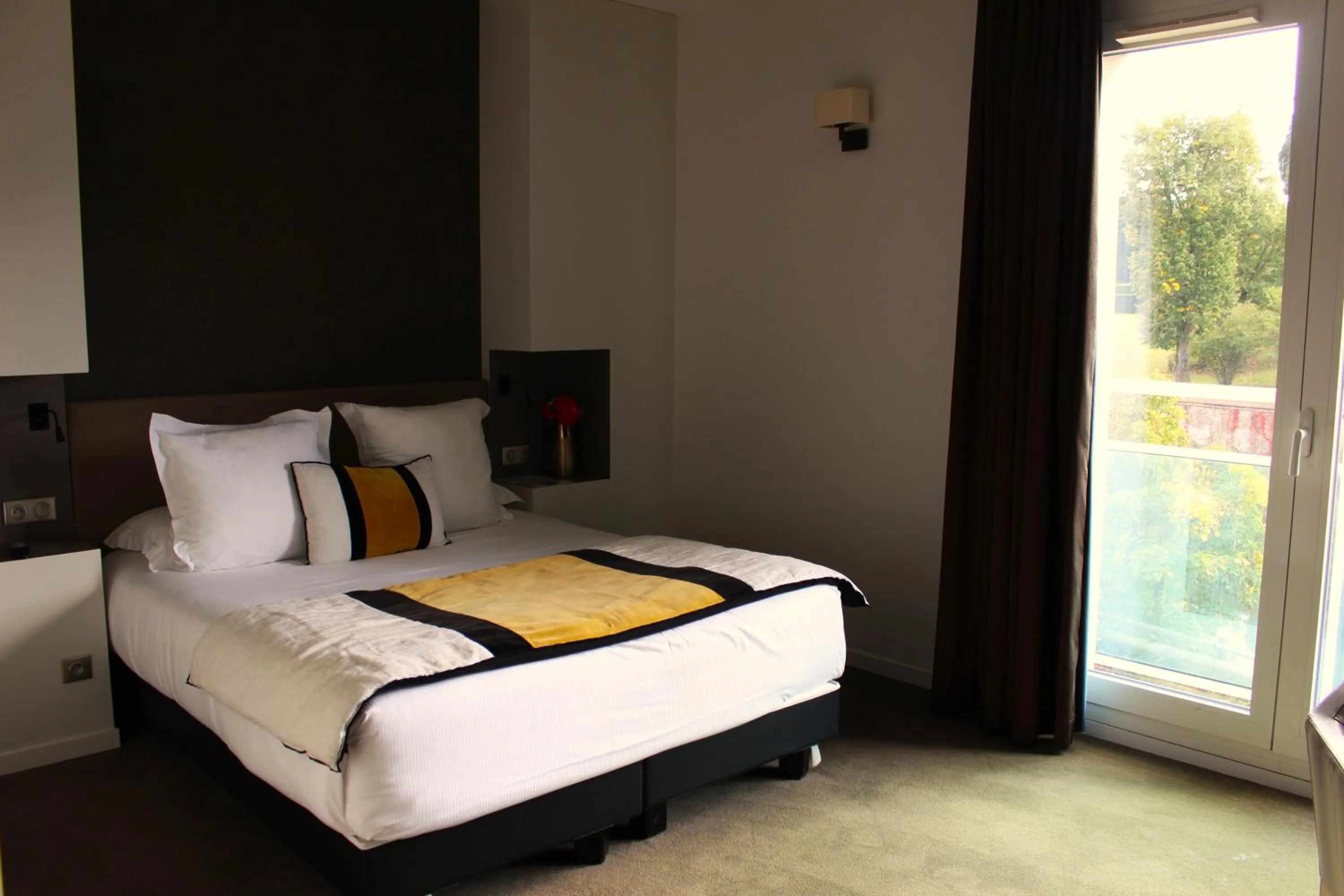 Bed in Le Konine - Hotel & Bar & Restaurant