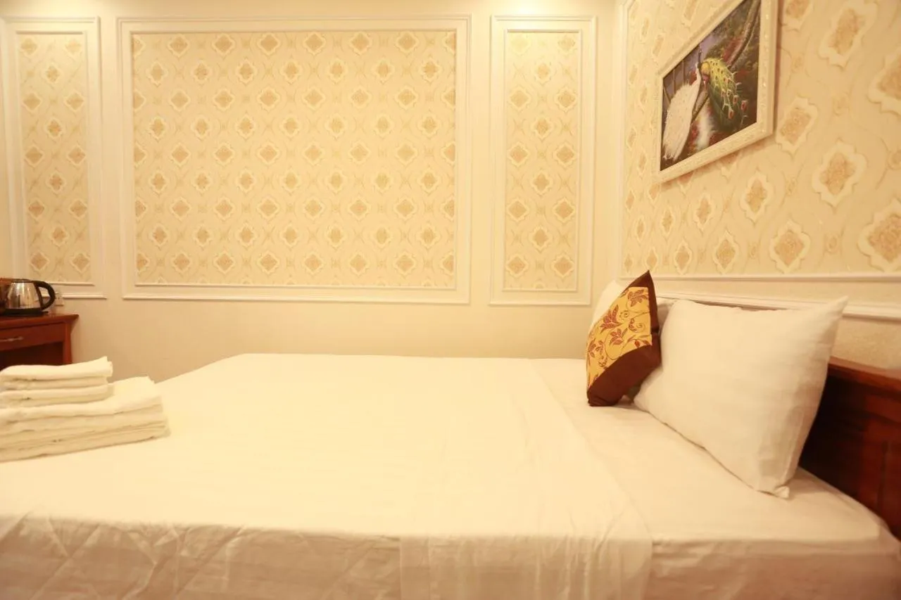 Bed in THANH TAI HOTEl 1