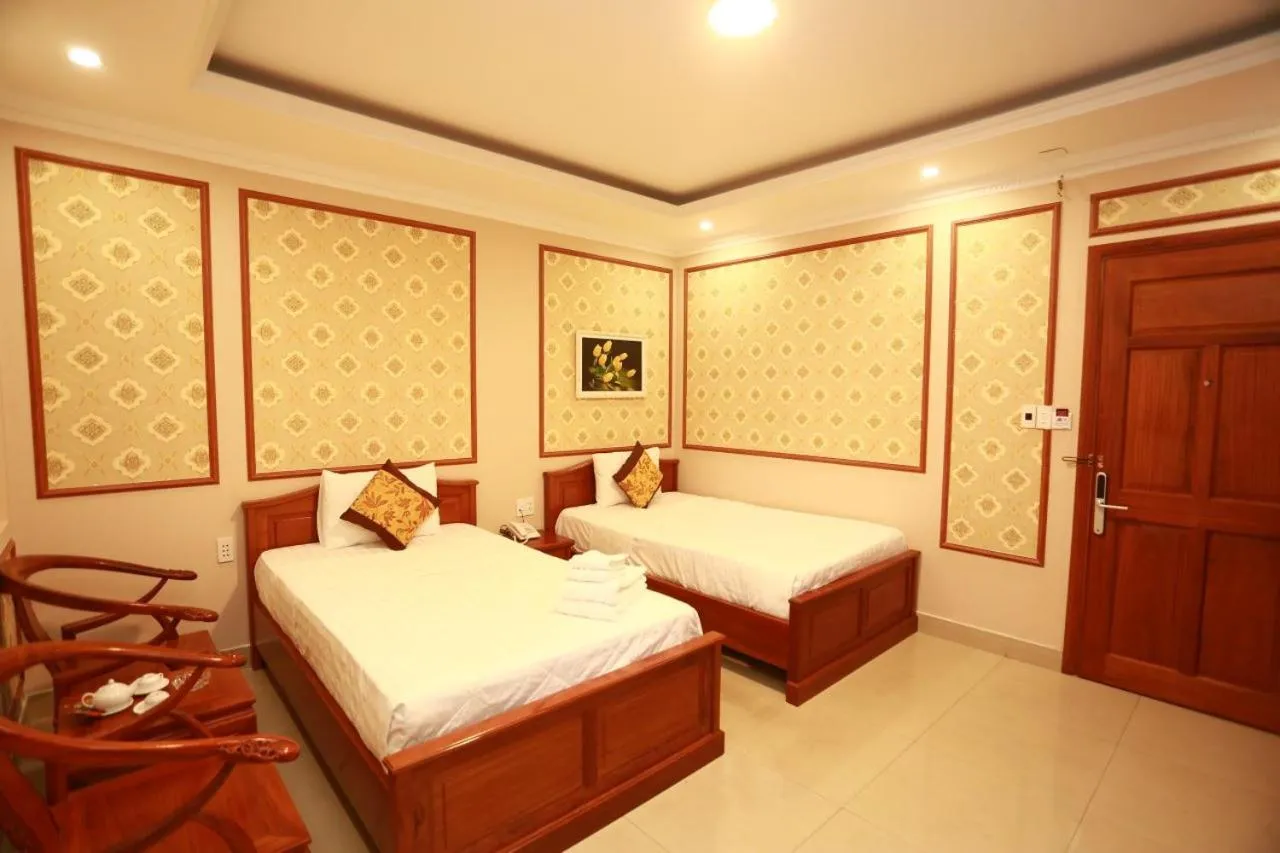 Bed in THANH TAI HOTEl 1