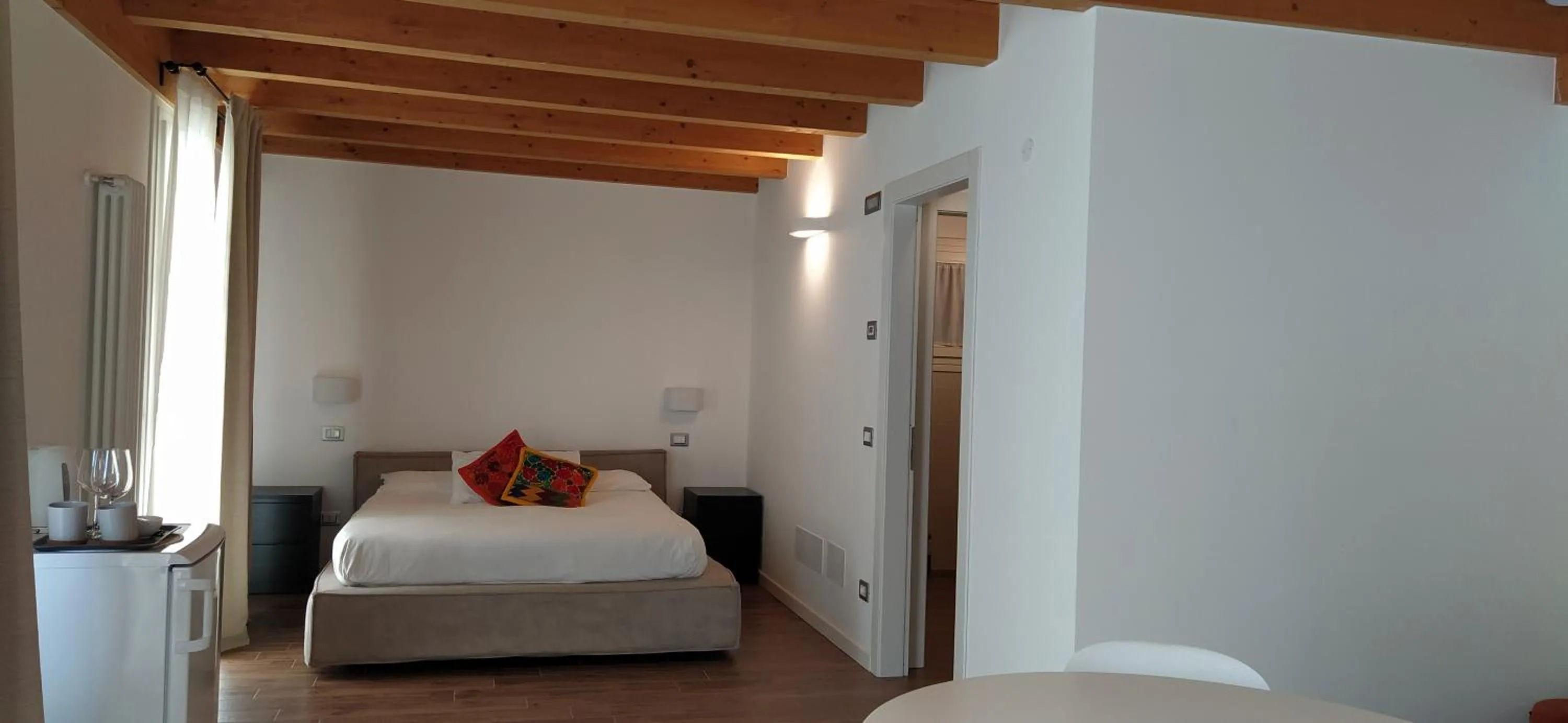 Photo of the whole room, Bed in Carmen de Nella Eco Lodge 4*