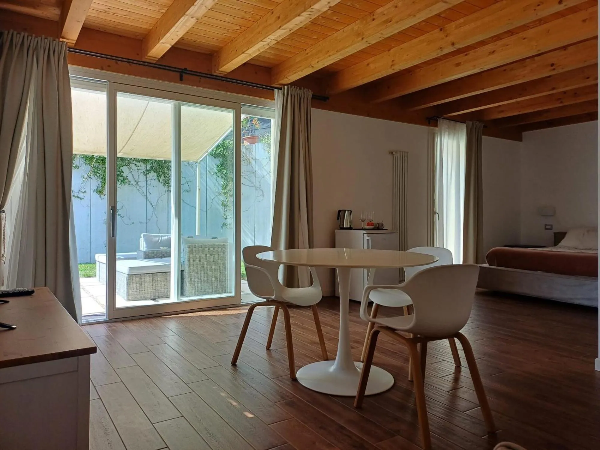 Bedroom in Carmen de Nella Eco Lodge 4*