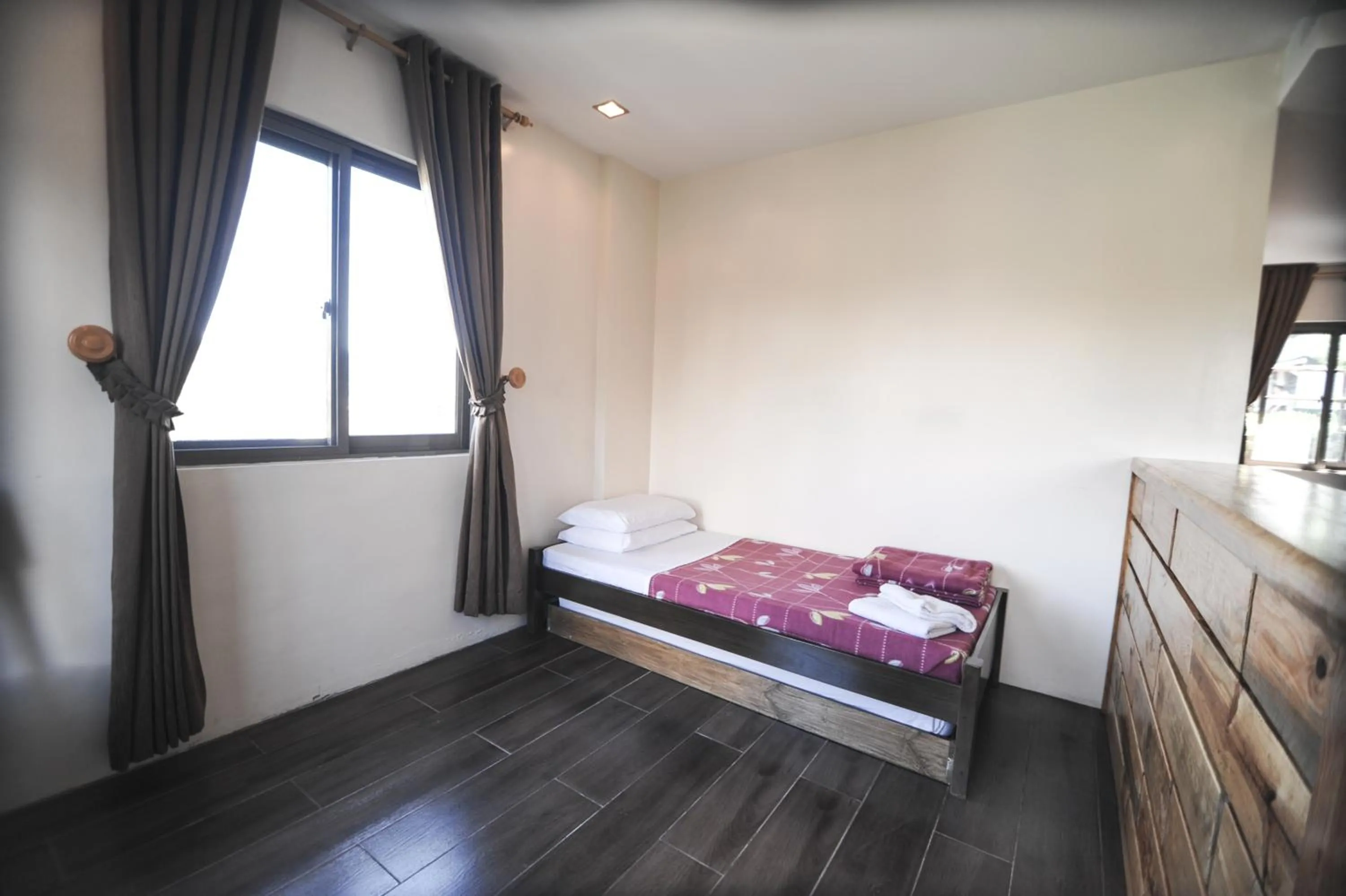 Bed in Pine Breeze Cottages