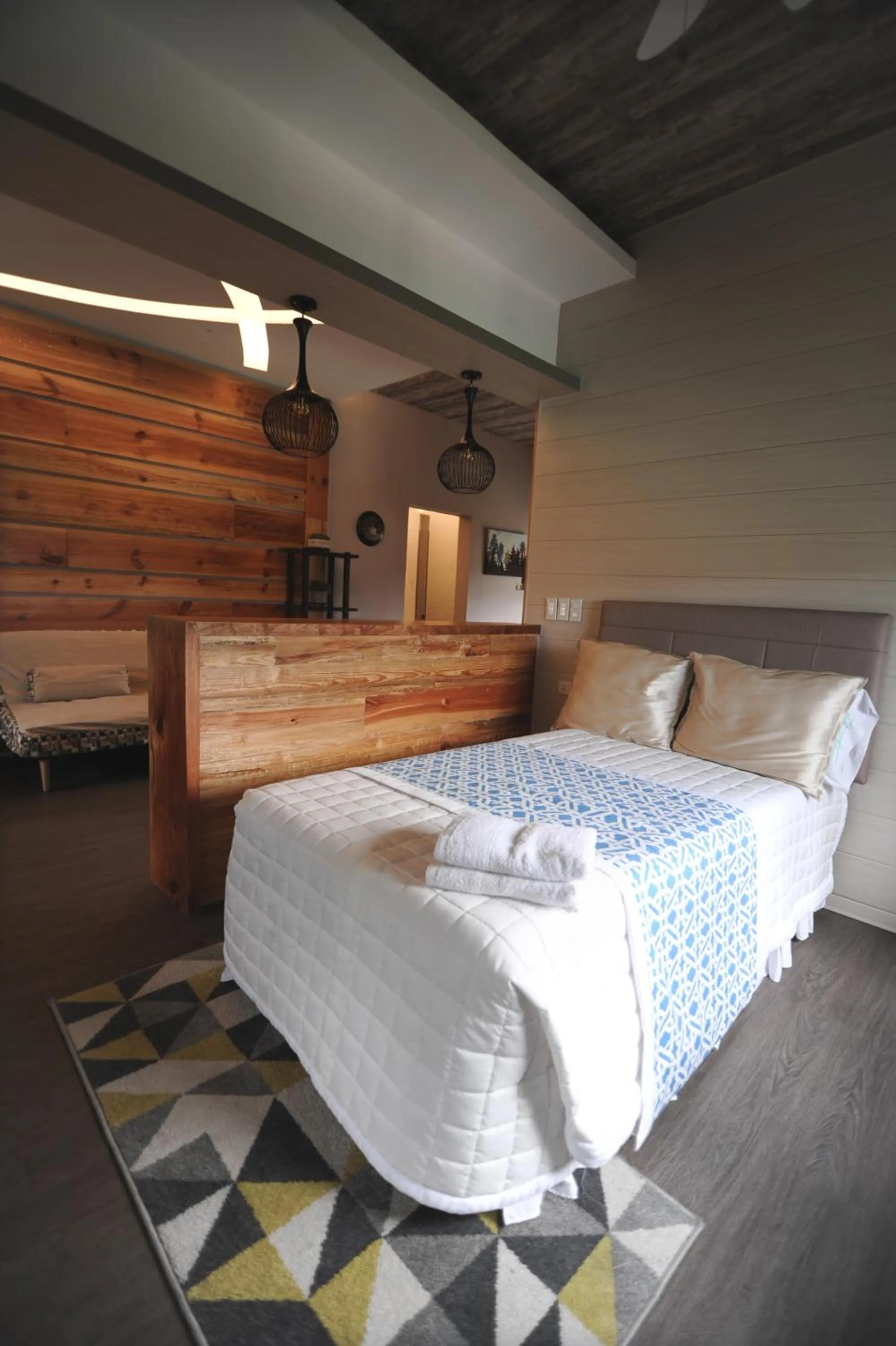 Bed in Pine Breeze Cottages
