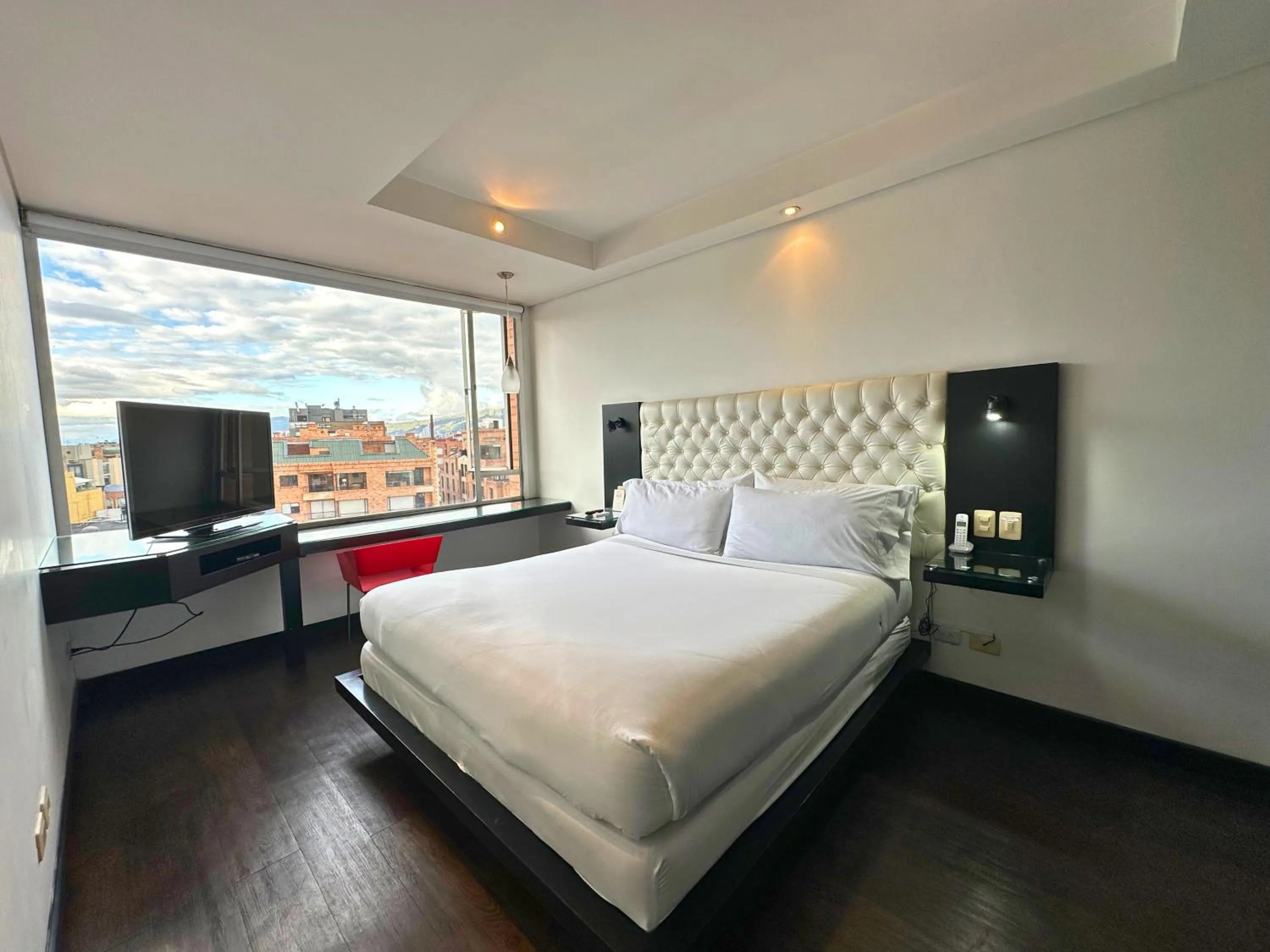 Bed in Hotel 104 Art Suites