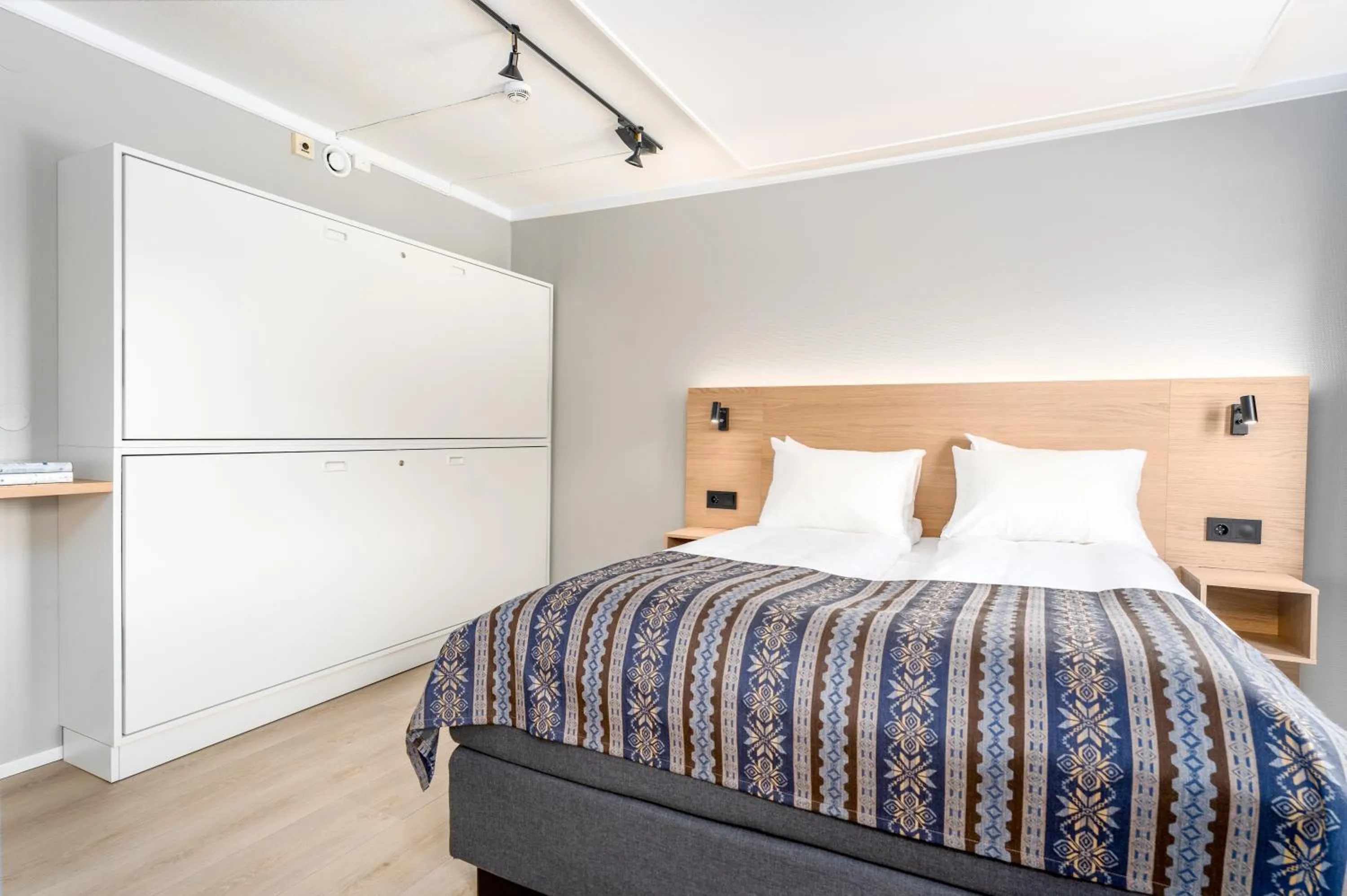 Bed in Birkebeineren Hotel & Apartments