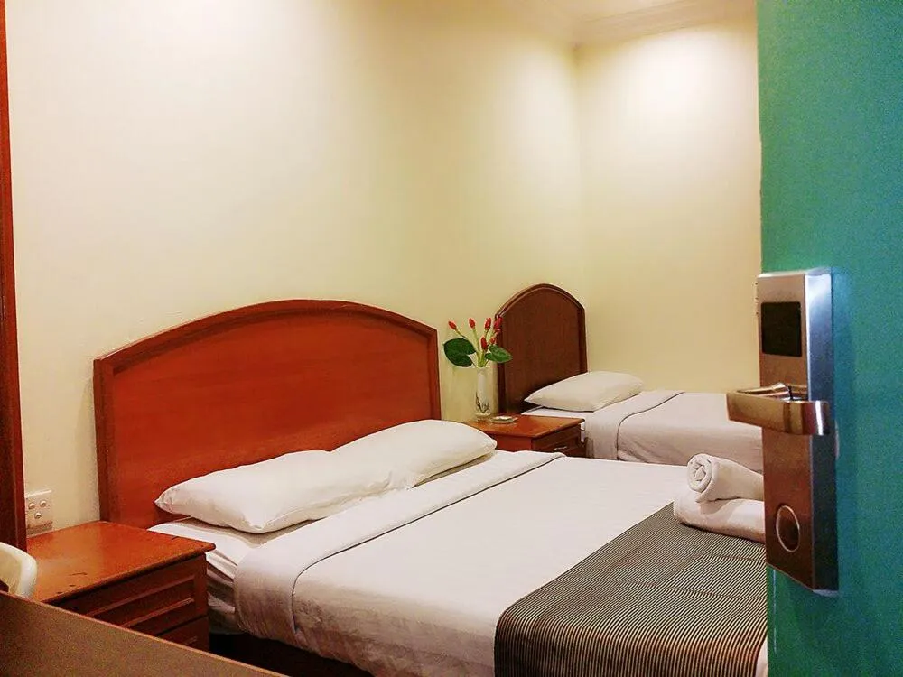 Bed in SkyGlobal Hotel