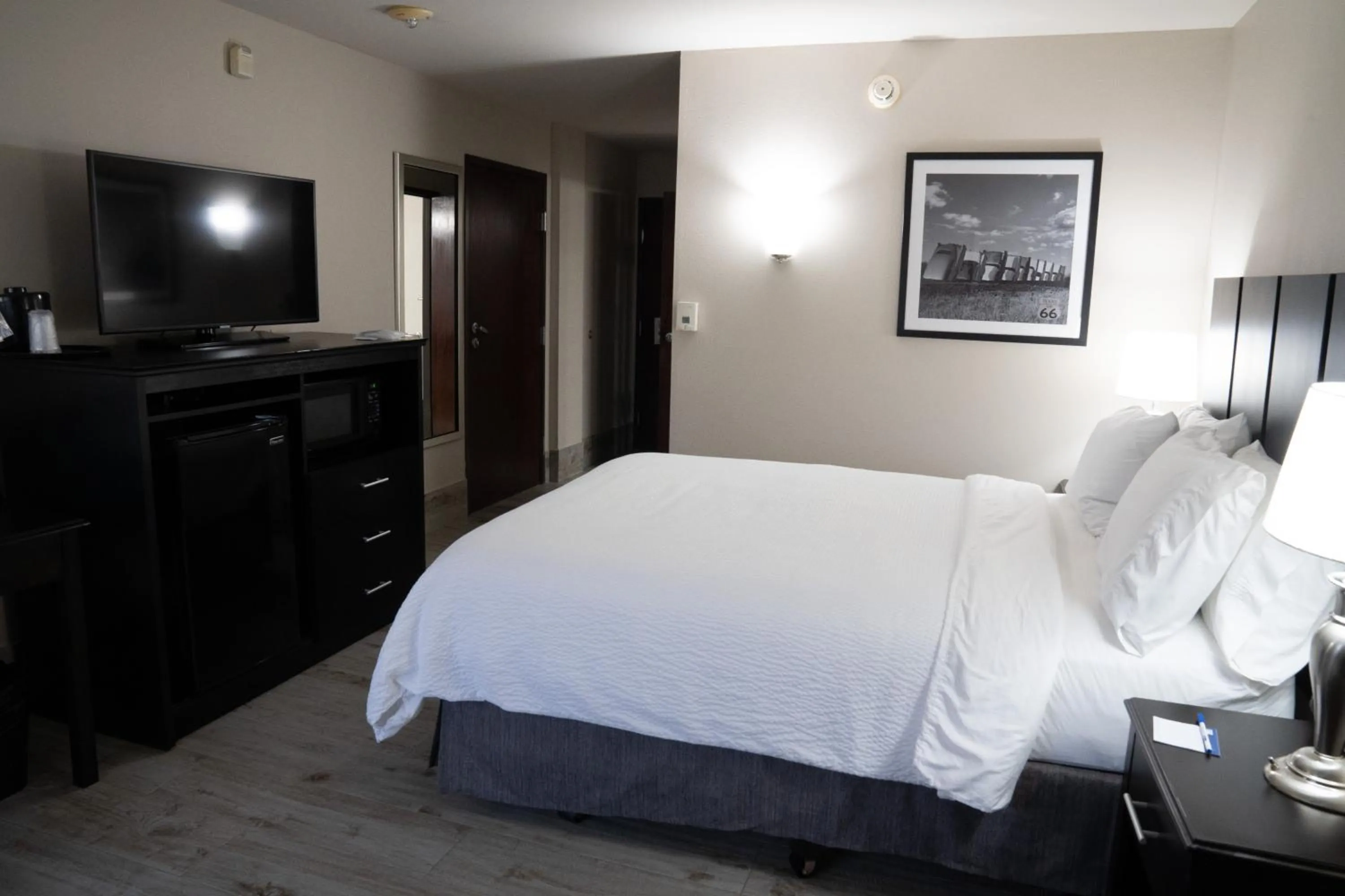 Bed in Lucille's Hotel, Restaurant, & Bar