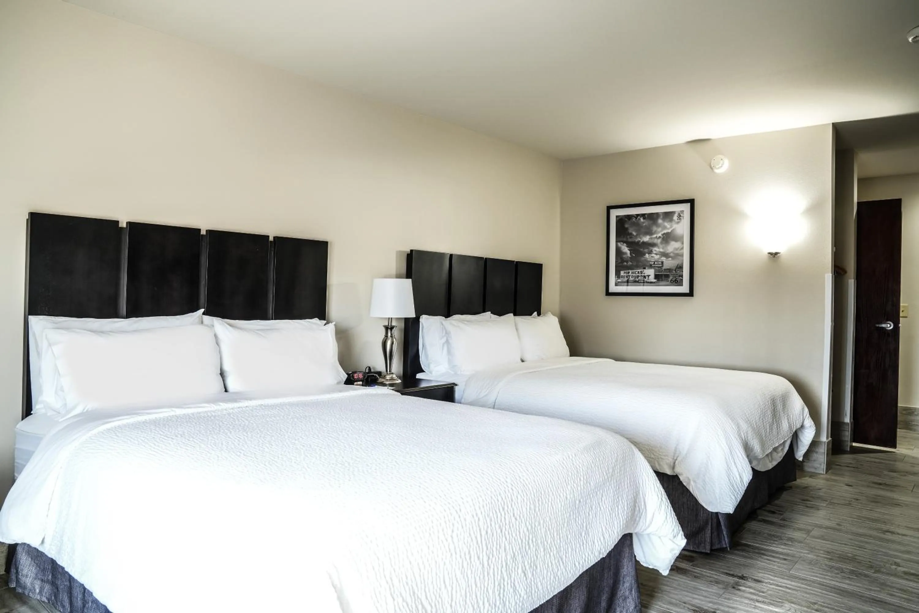 Bed in Lucille's Hotel, Restaurant, & Bar