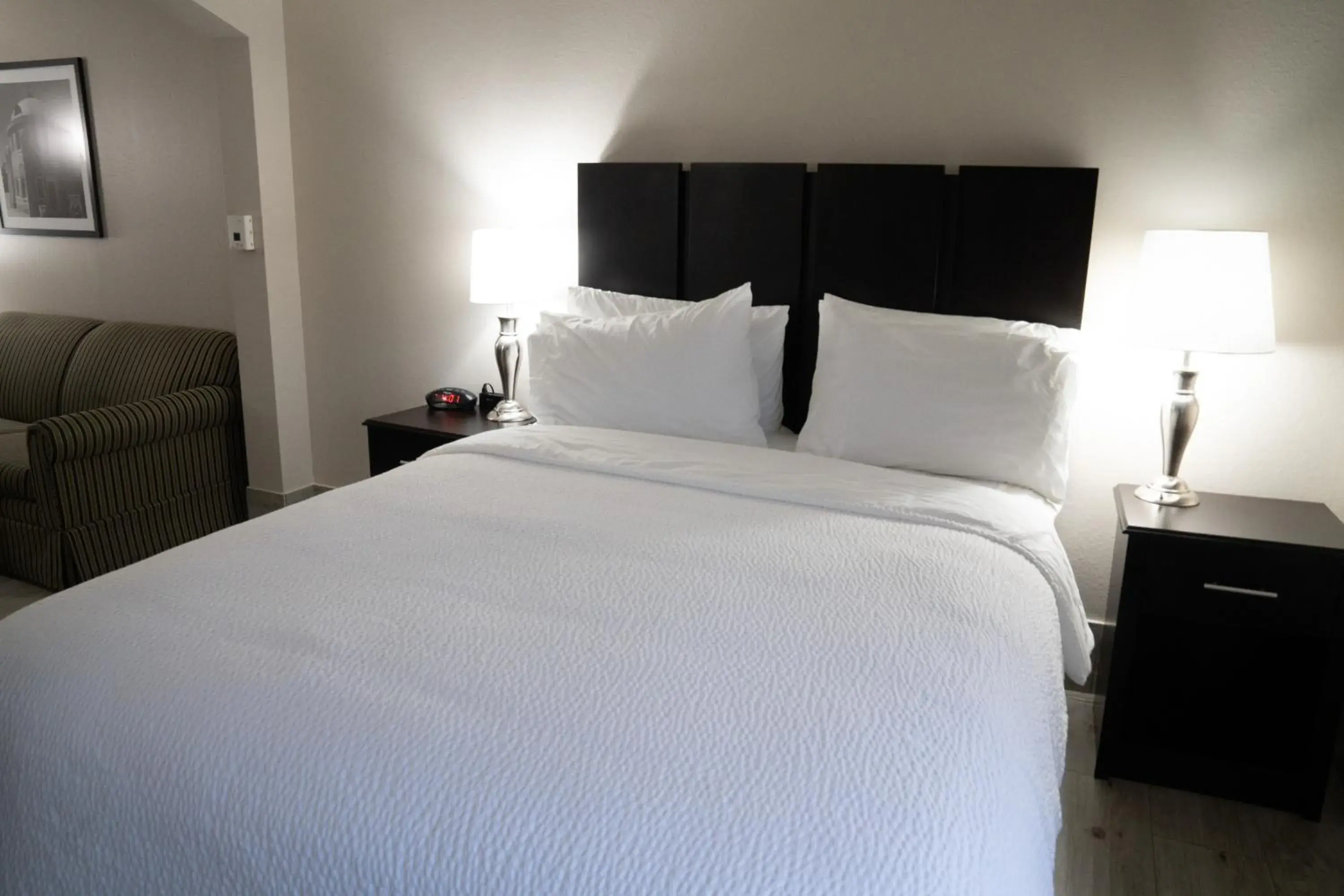 Queen Room with Accessible Transfer Shower - Non-Smoking in Lucille's Hotel, Restaurant, & Bar Queen Room with Accessible Transfer Shower - Non-Smoking in Lucille's Hotel, Restaurant, & Bar