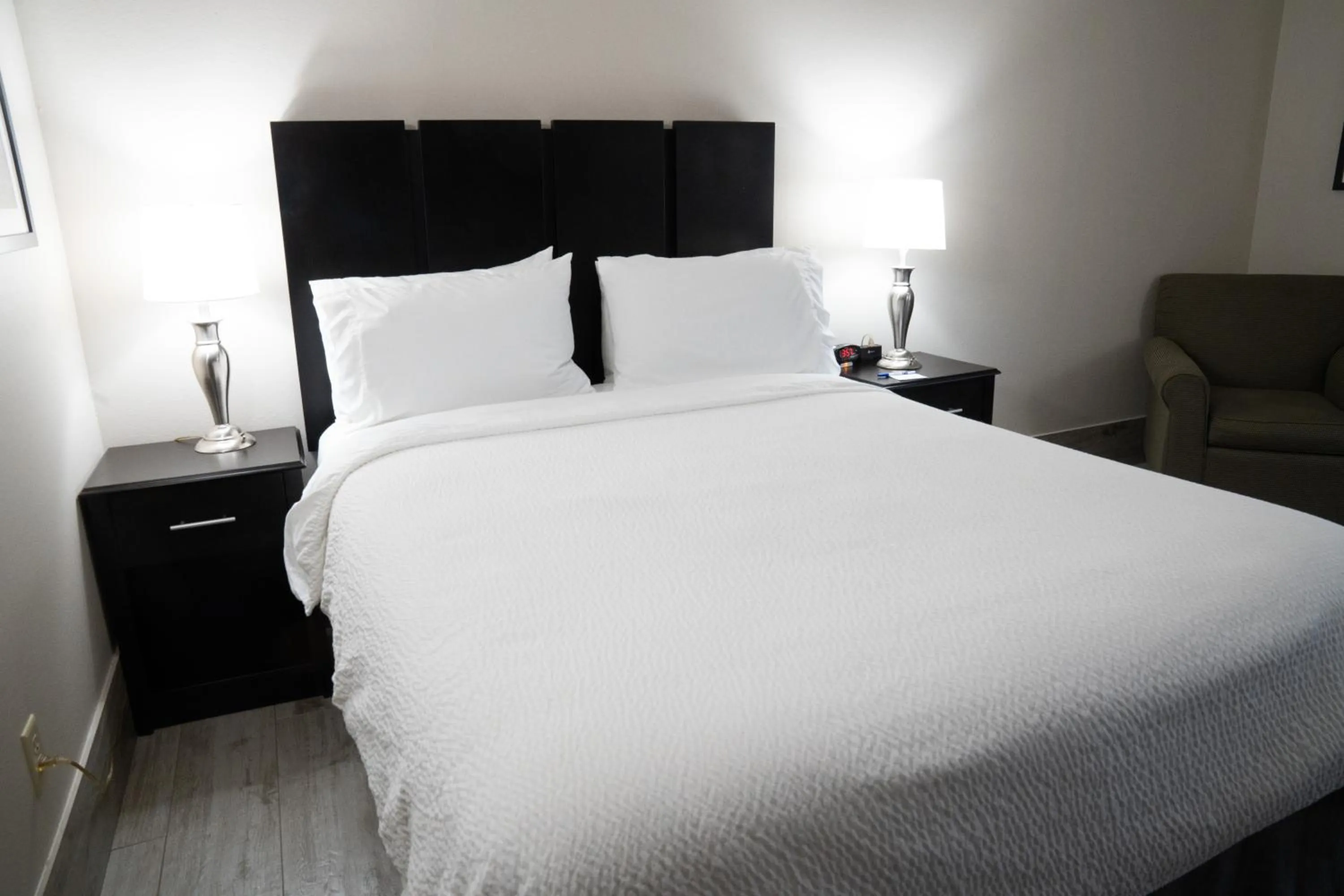 Bed in Lucille's Hotel, Restaurant, & Bar