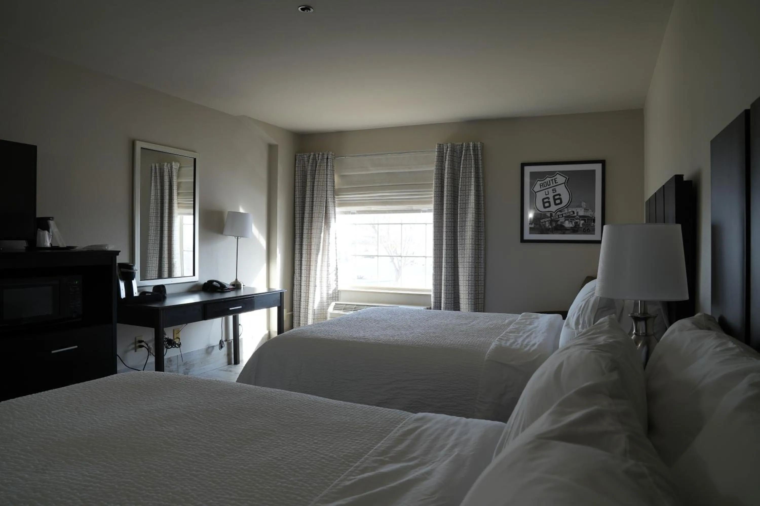 Bed in Lucille's Hotel, Restaurant, & Bar