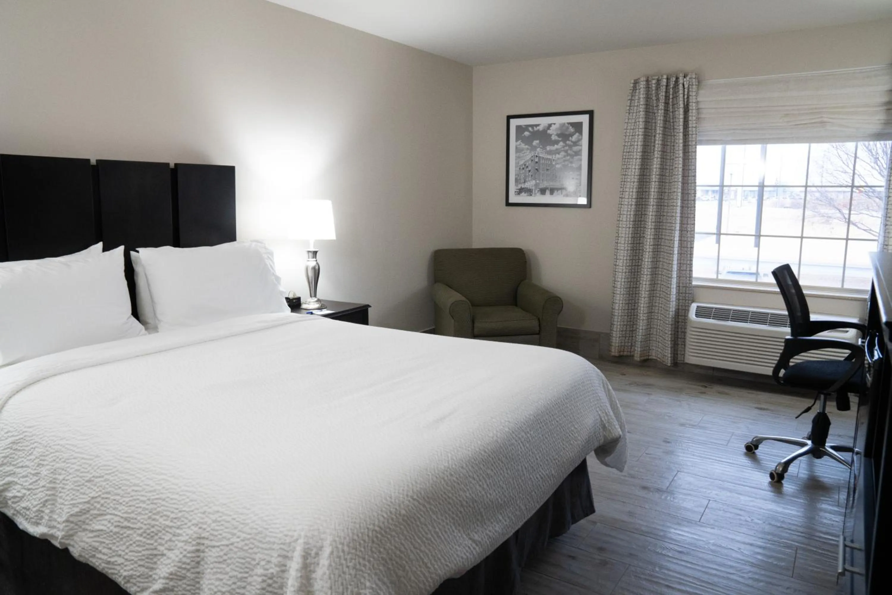 Bed in Lucille's Hotel, Restaurant, & Bar