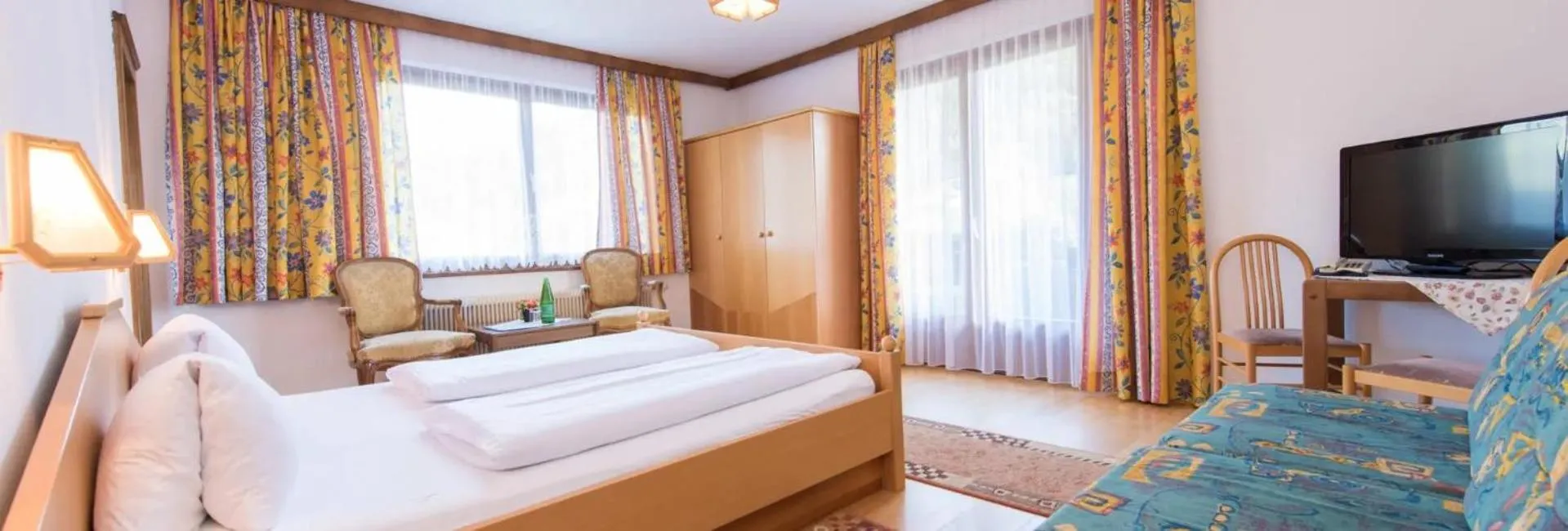 Bed in Hotel Mölltalerhof