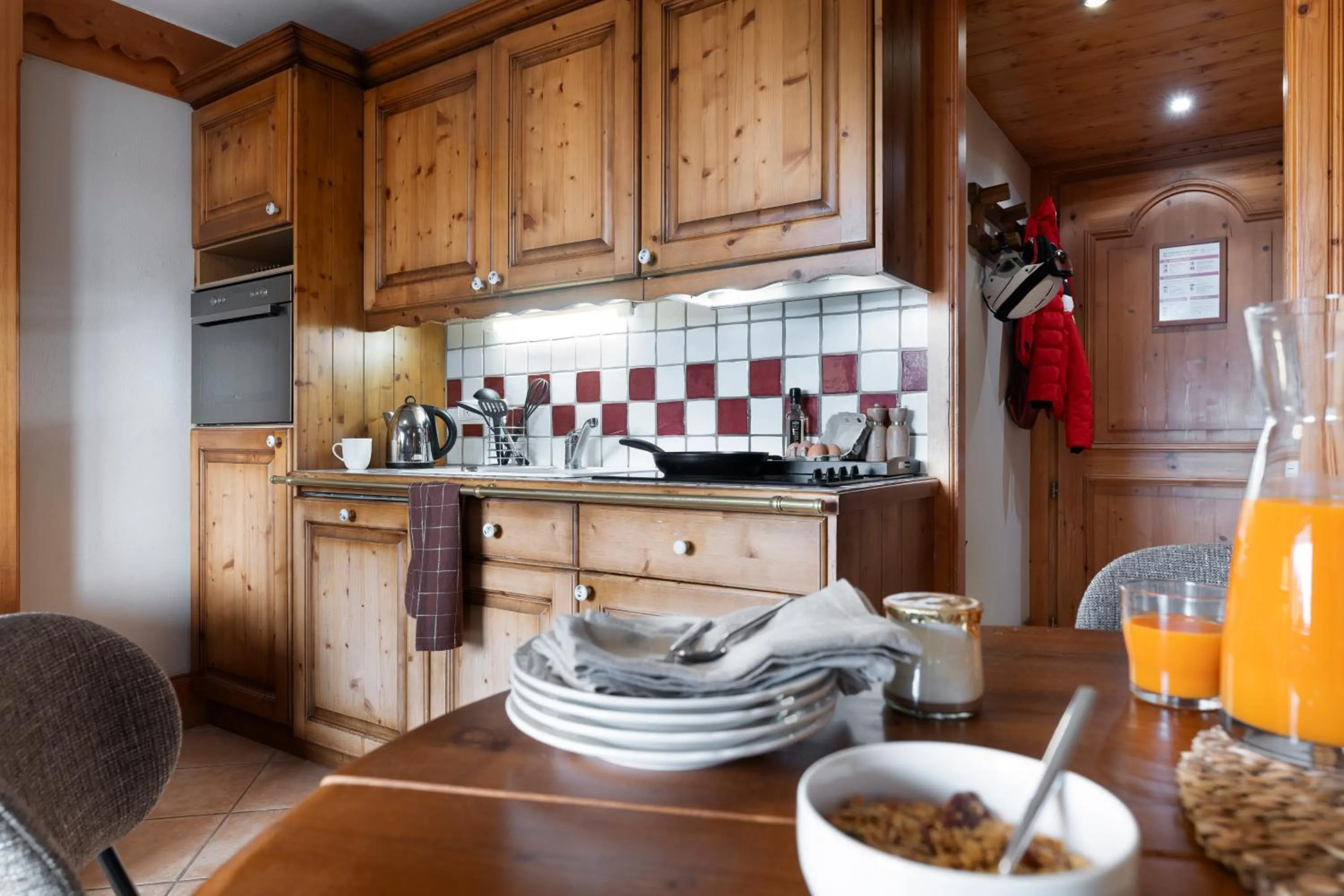 Kitchen or kitchenette in Résidence Pierre & Vacances Premium Les Fermes De Méribel