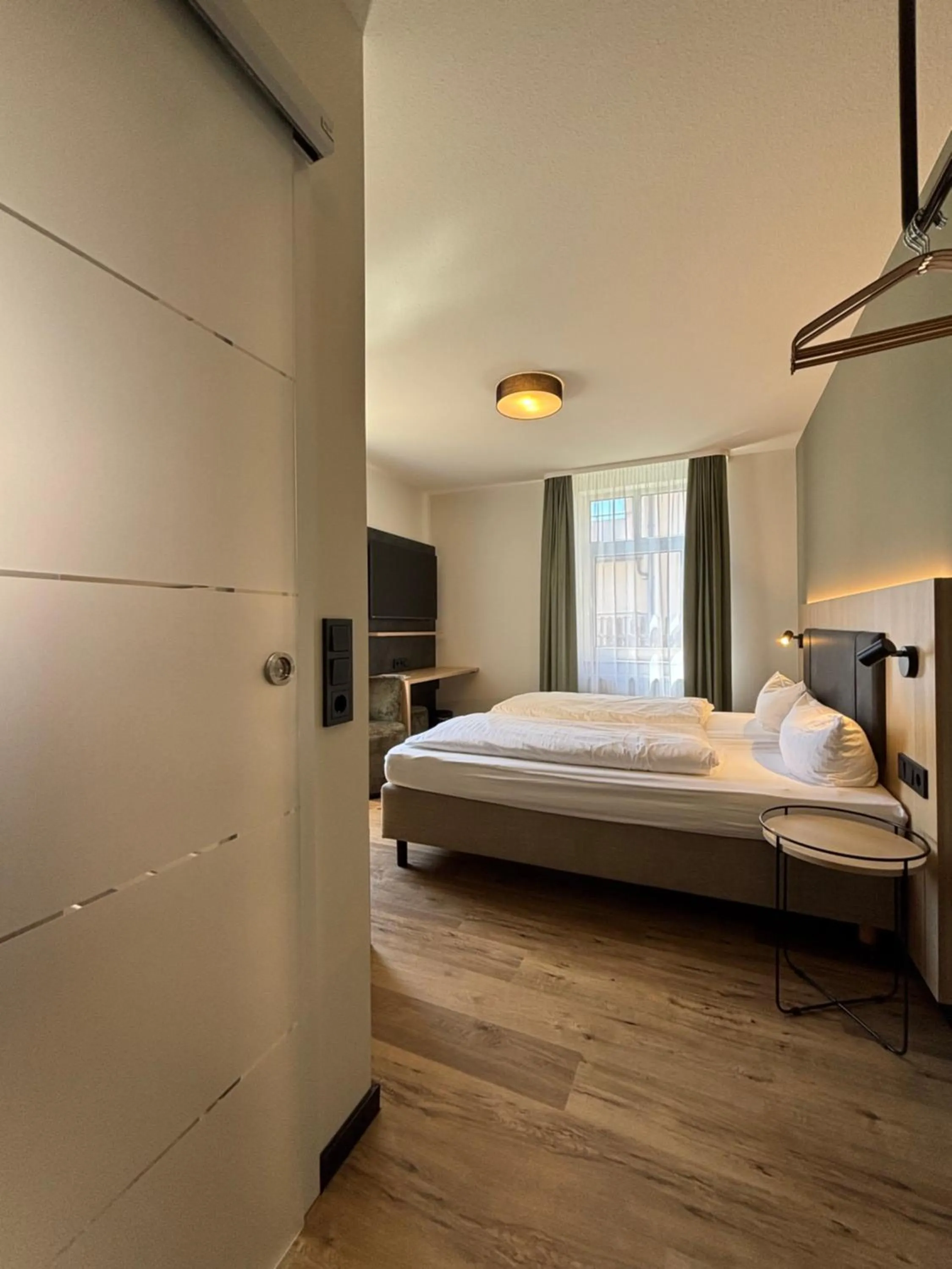 Photo of the whole room, Bed in Hotel am Stadthaus