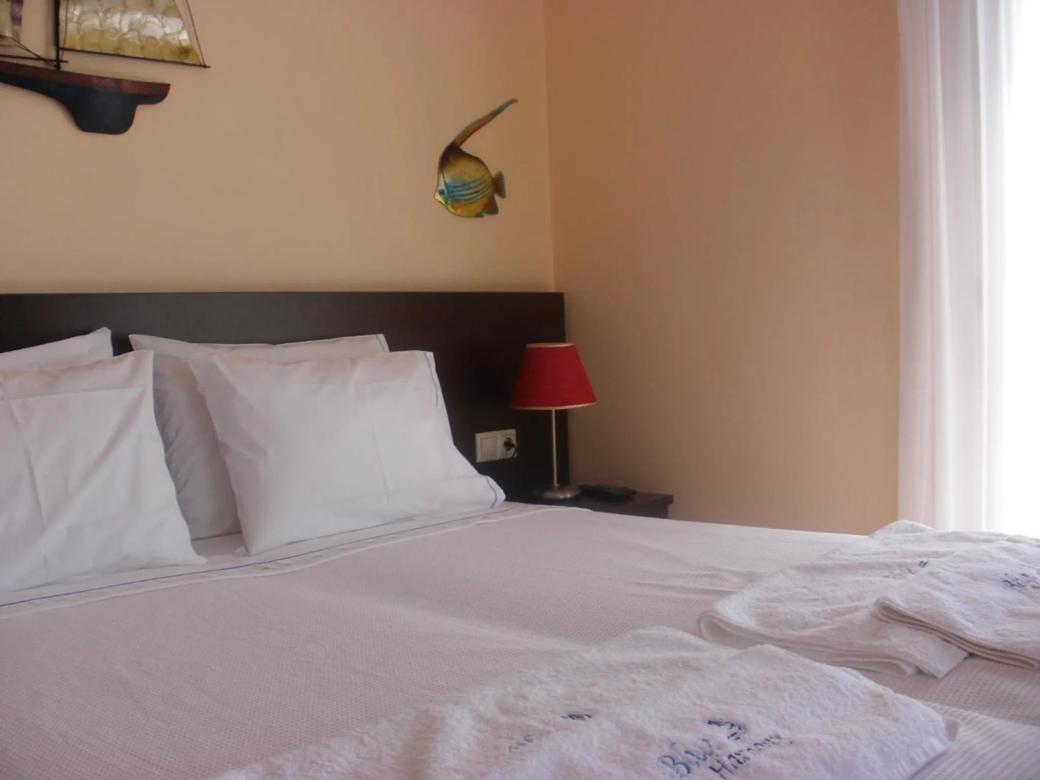 Property building, Bed in Blue Harmony Apartments