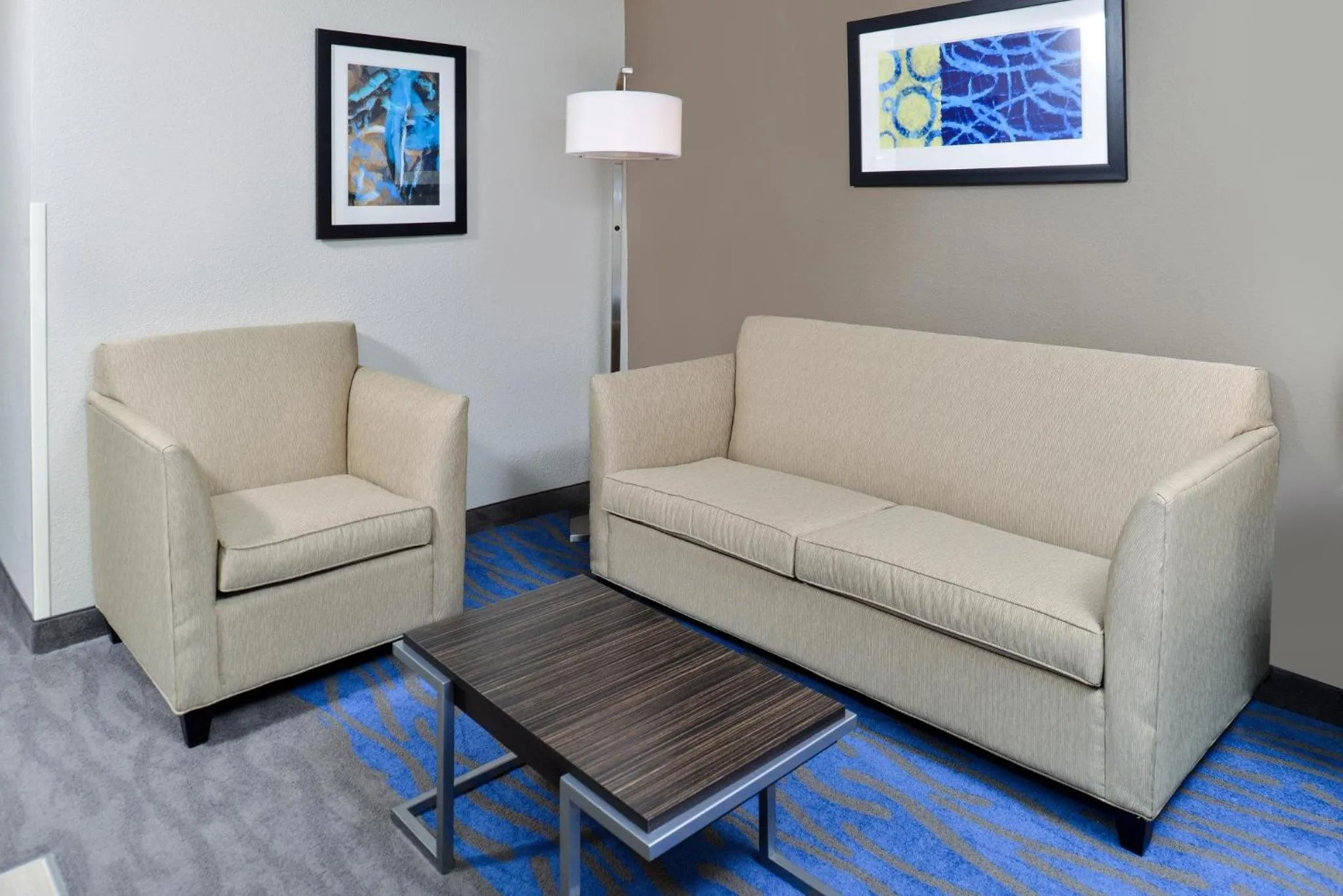 Living room in Holiday Inn Express Hotel & Suites St. Louis West-O'Fallon by IHG