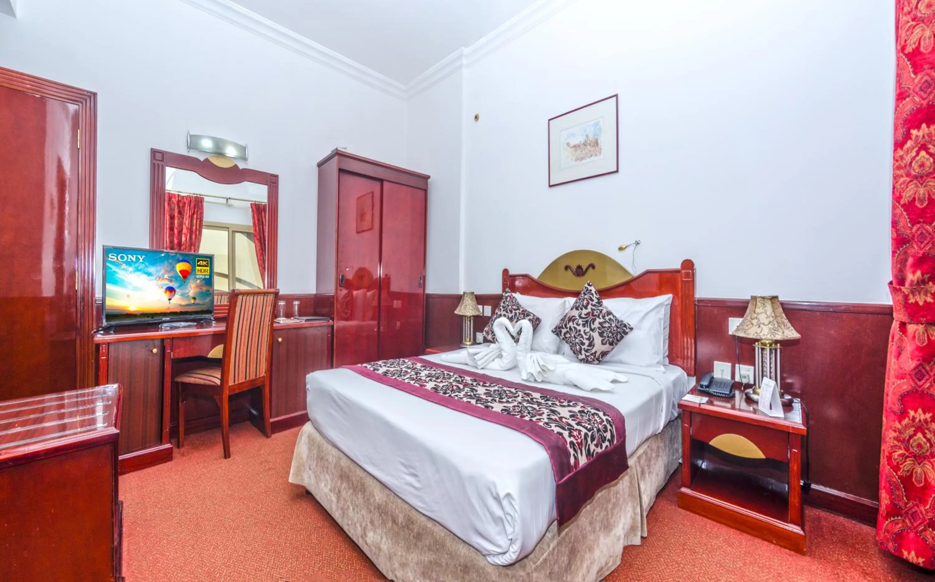 Bed in Zain International Hotel