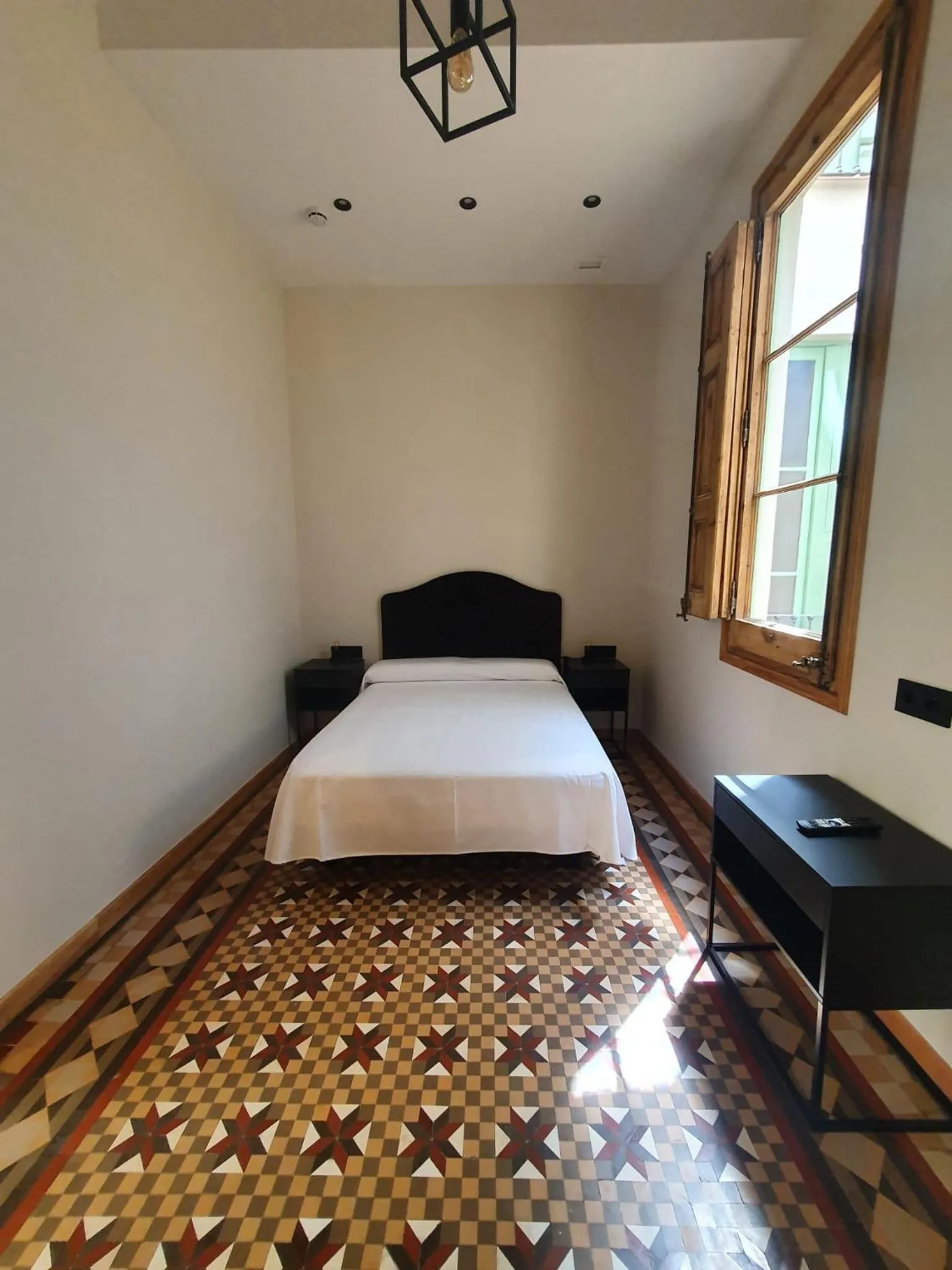 Photo of the whole room, Bed in Hostal Lausanne