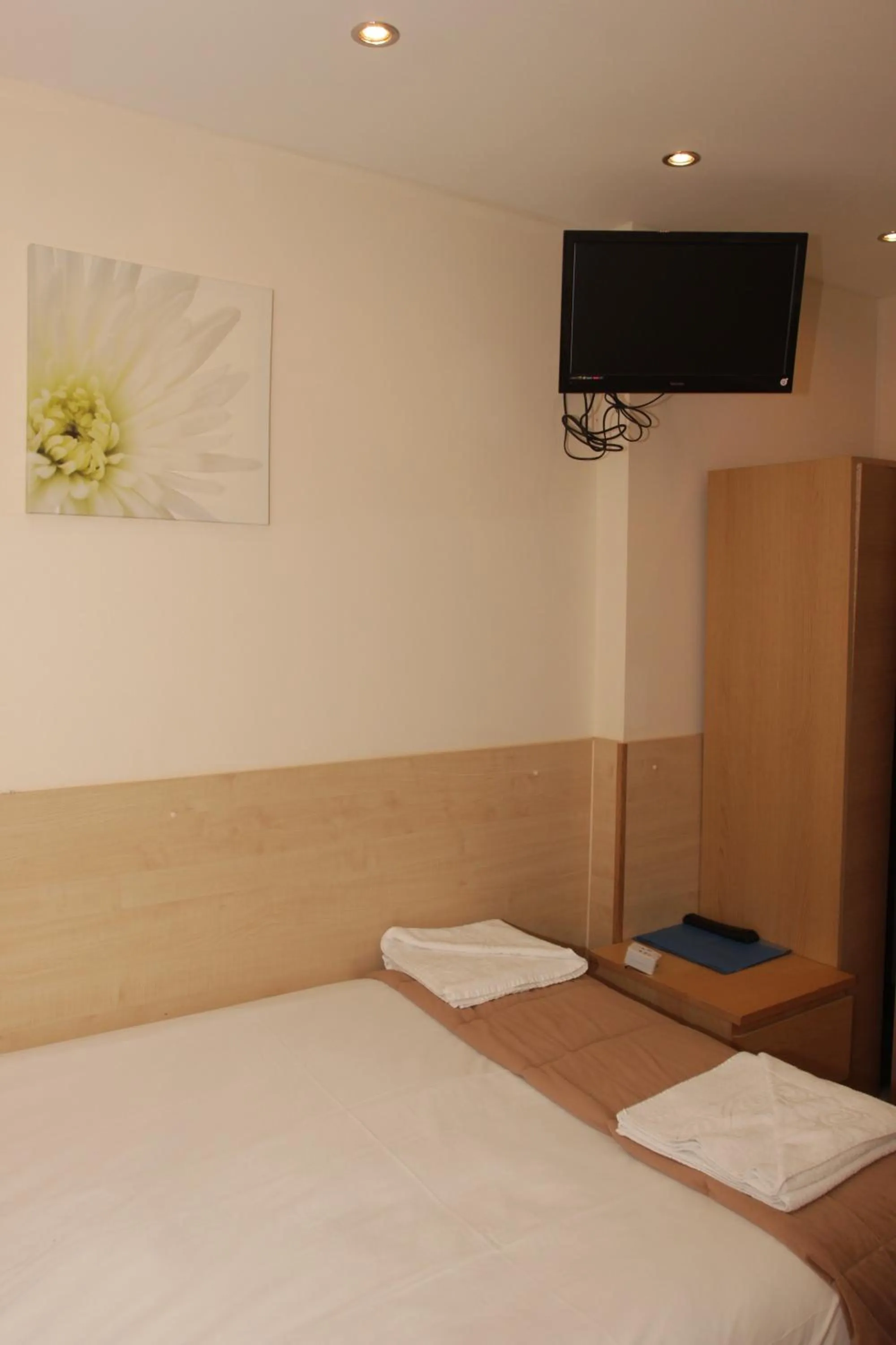 Bed in Tony's House Hotel