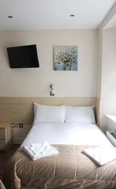 Bed in Tony's House Hotel