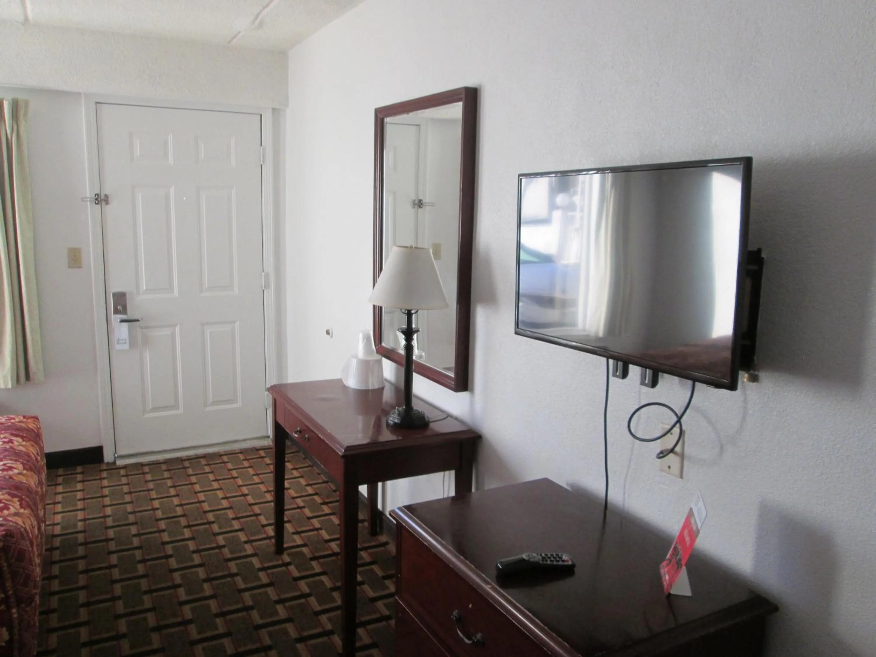 Bedroom in Budget Inn