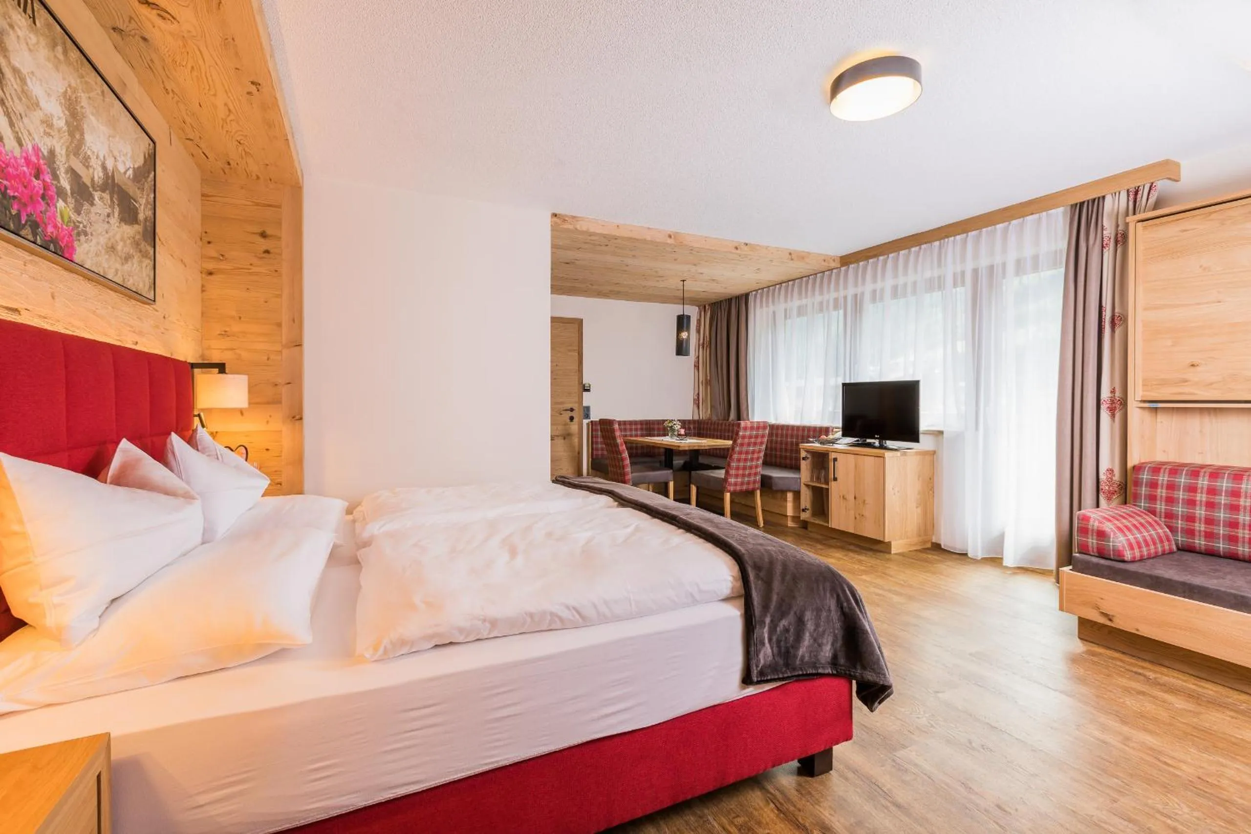 Living room, Bed in Hotel Augarten