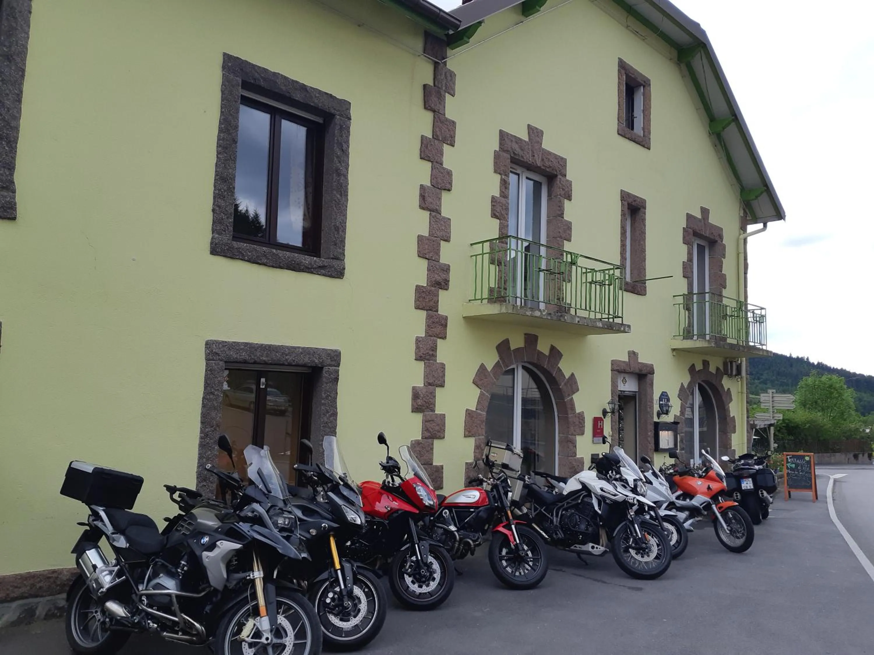 Property building in Hotel Restaurant Du Haut Du Roc