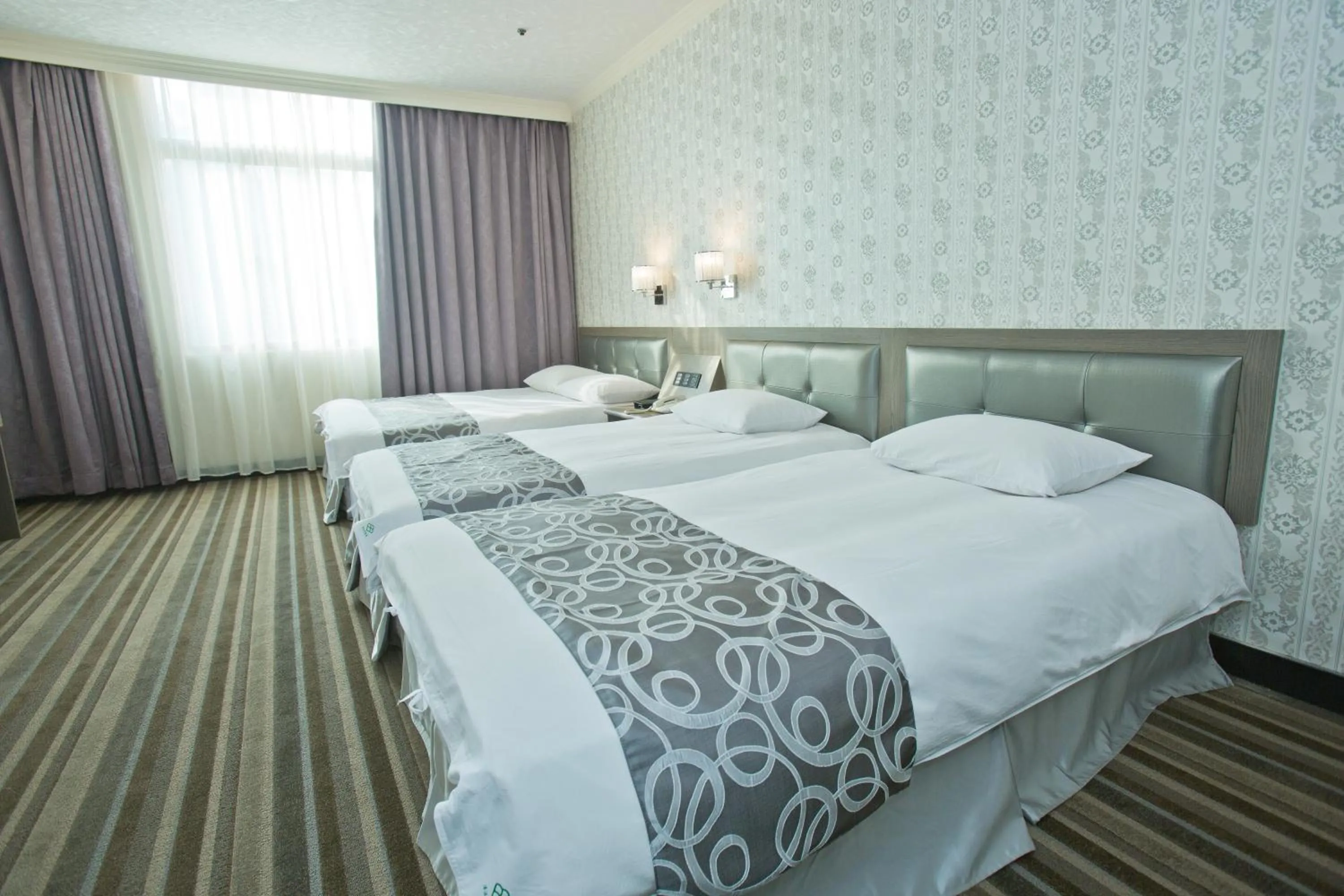 Bed in Hotel River Kinmen