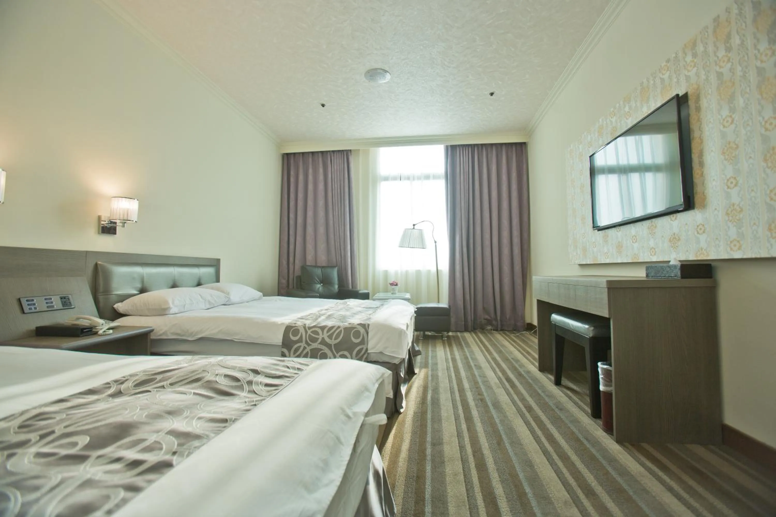 Bed in Hotel River Kinmen