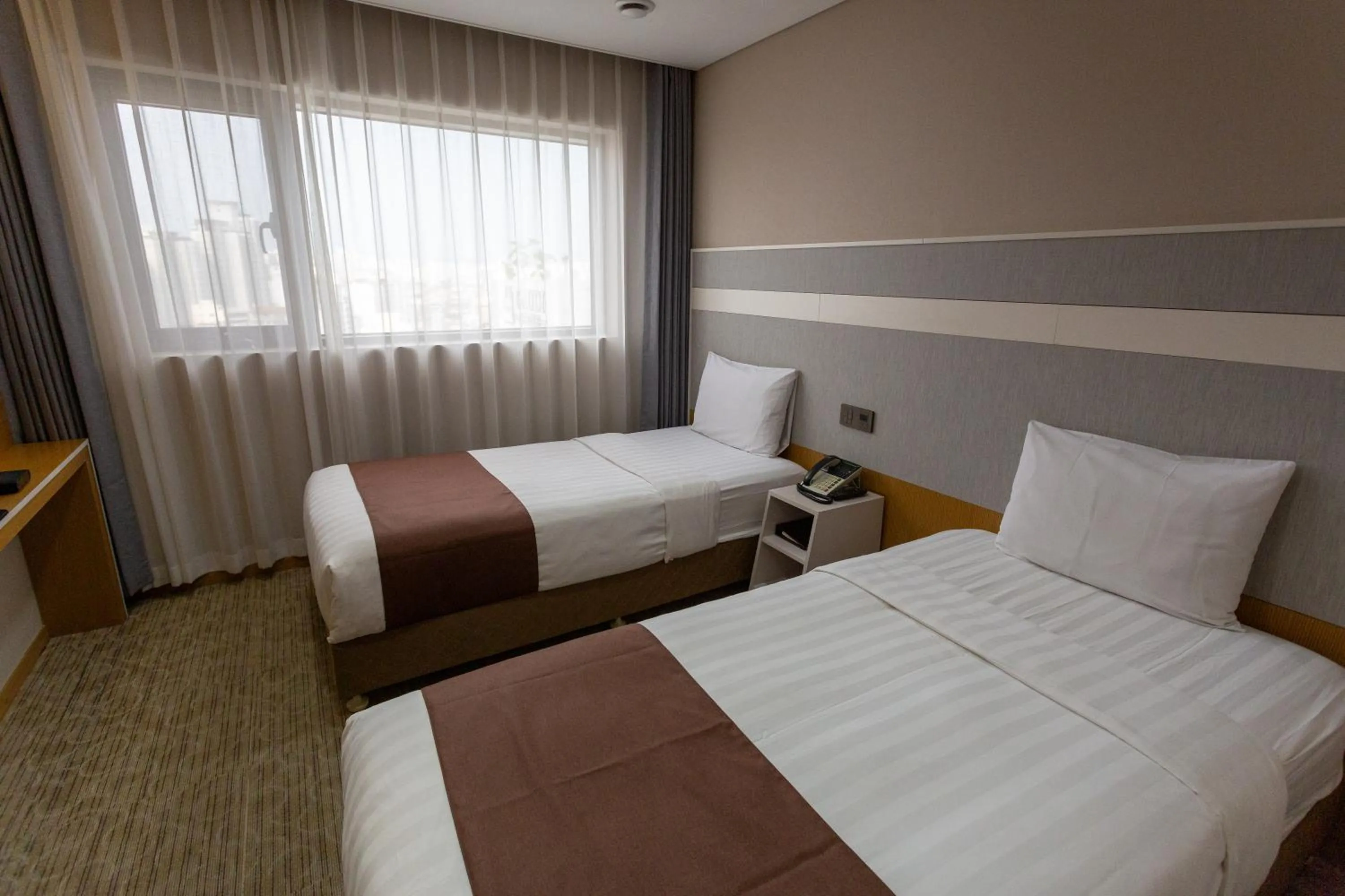 Bed in The Recenz Dongdaemun Hotel