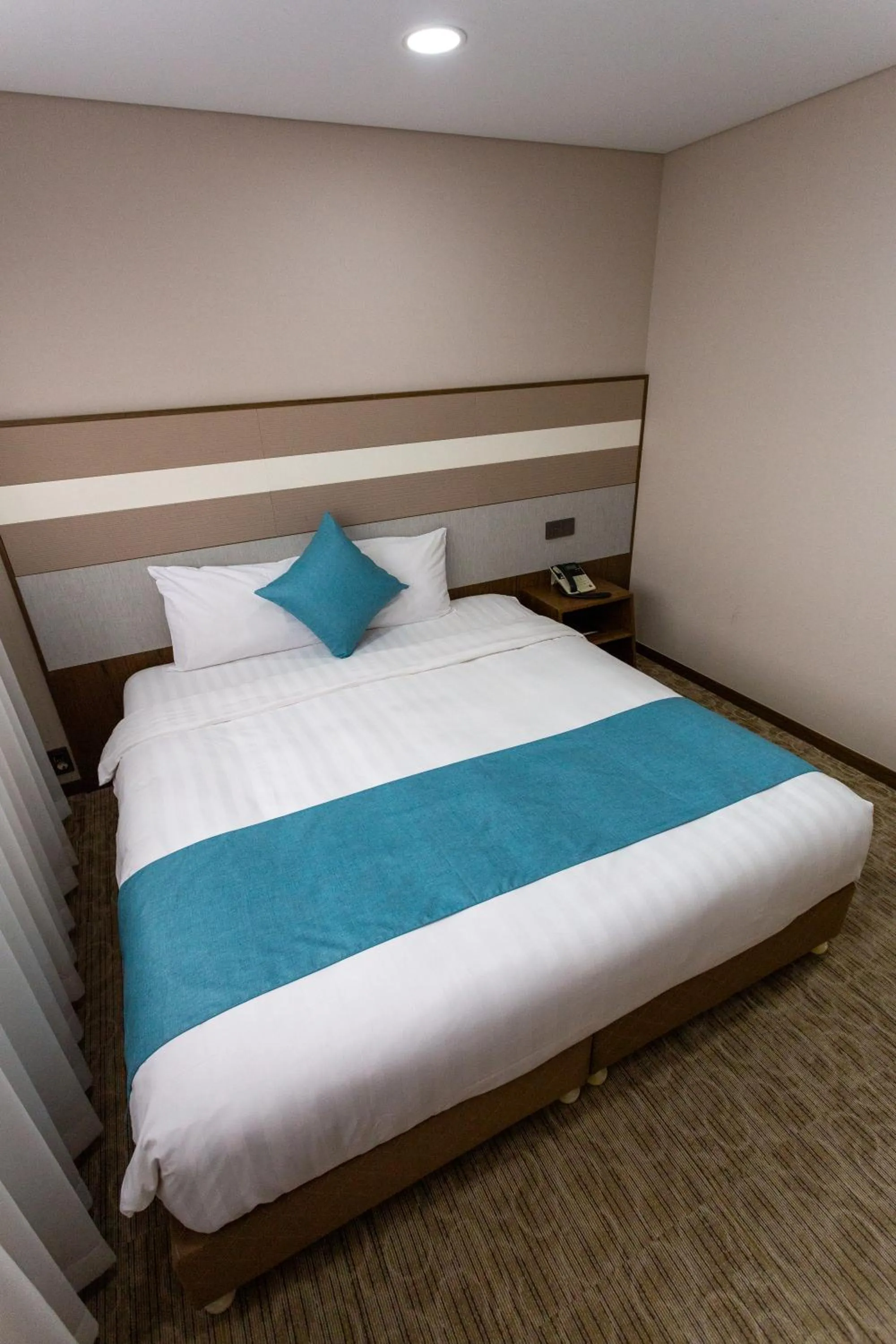 Bed in The Recenz Dongdaemun Hotel