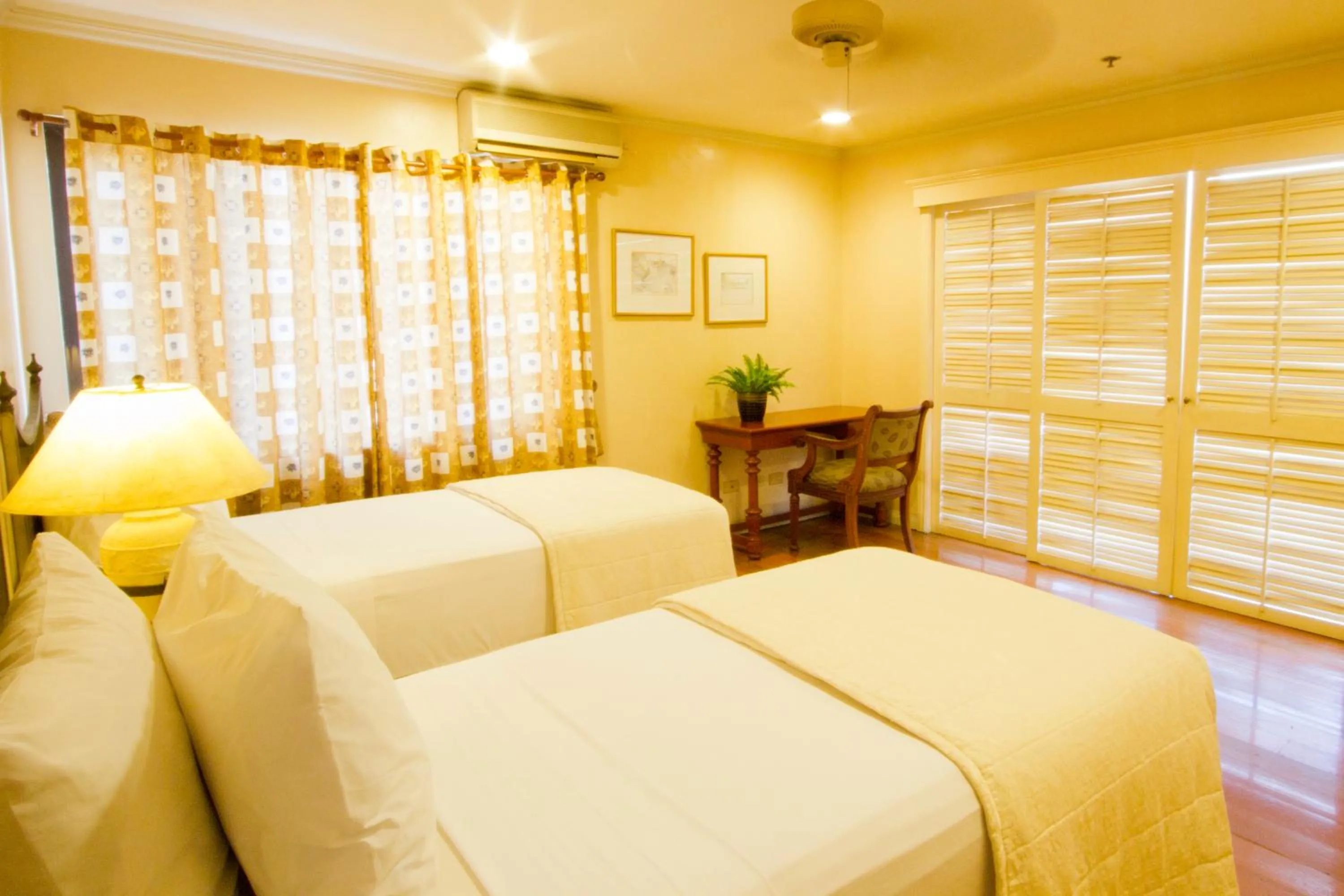 Bed in Sophia Suites Residence Hotel