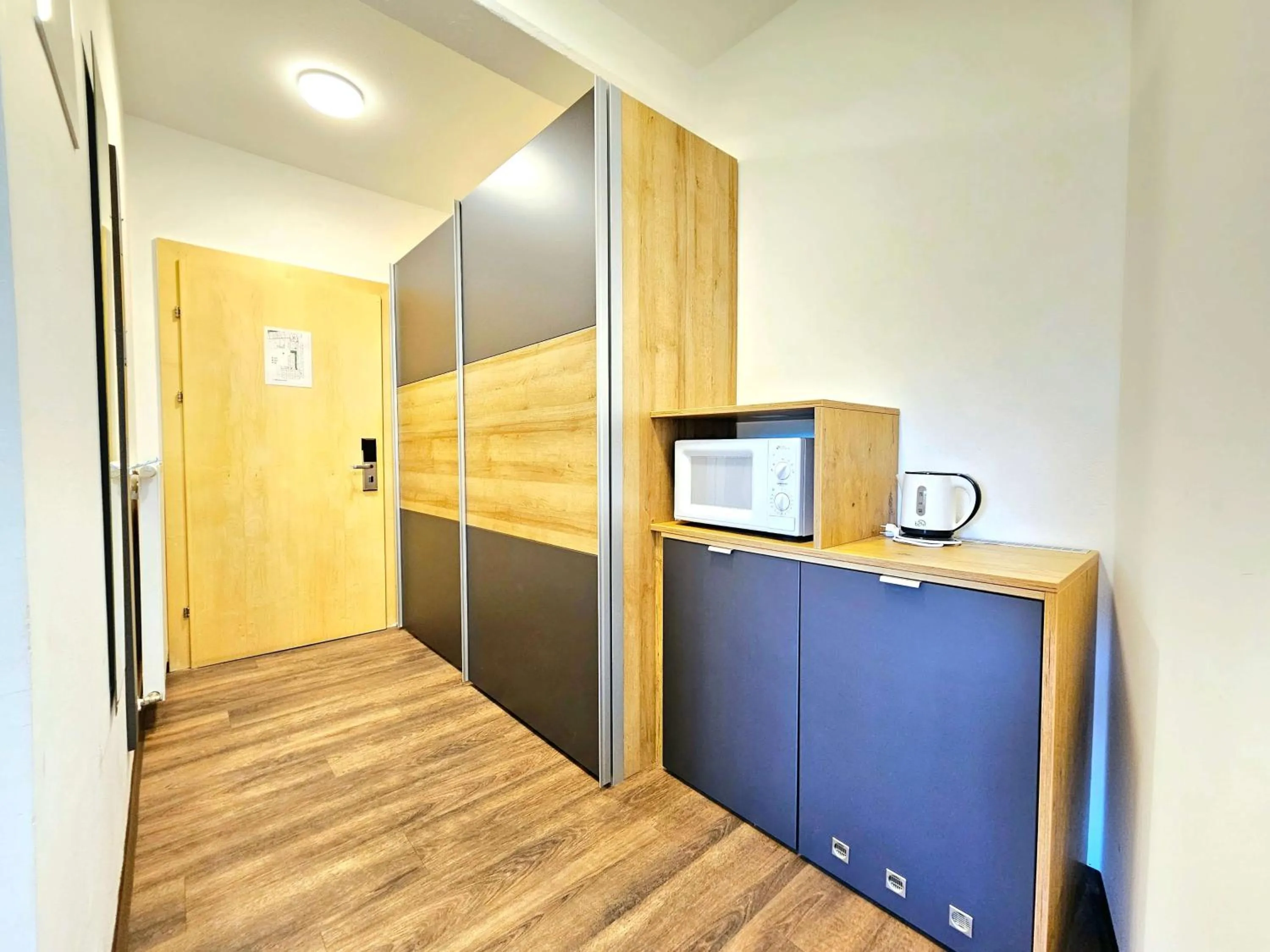 Kitchen or kitchenette in Familienhotel Trebesingerhof