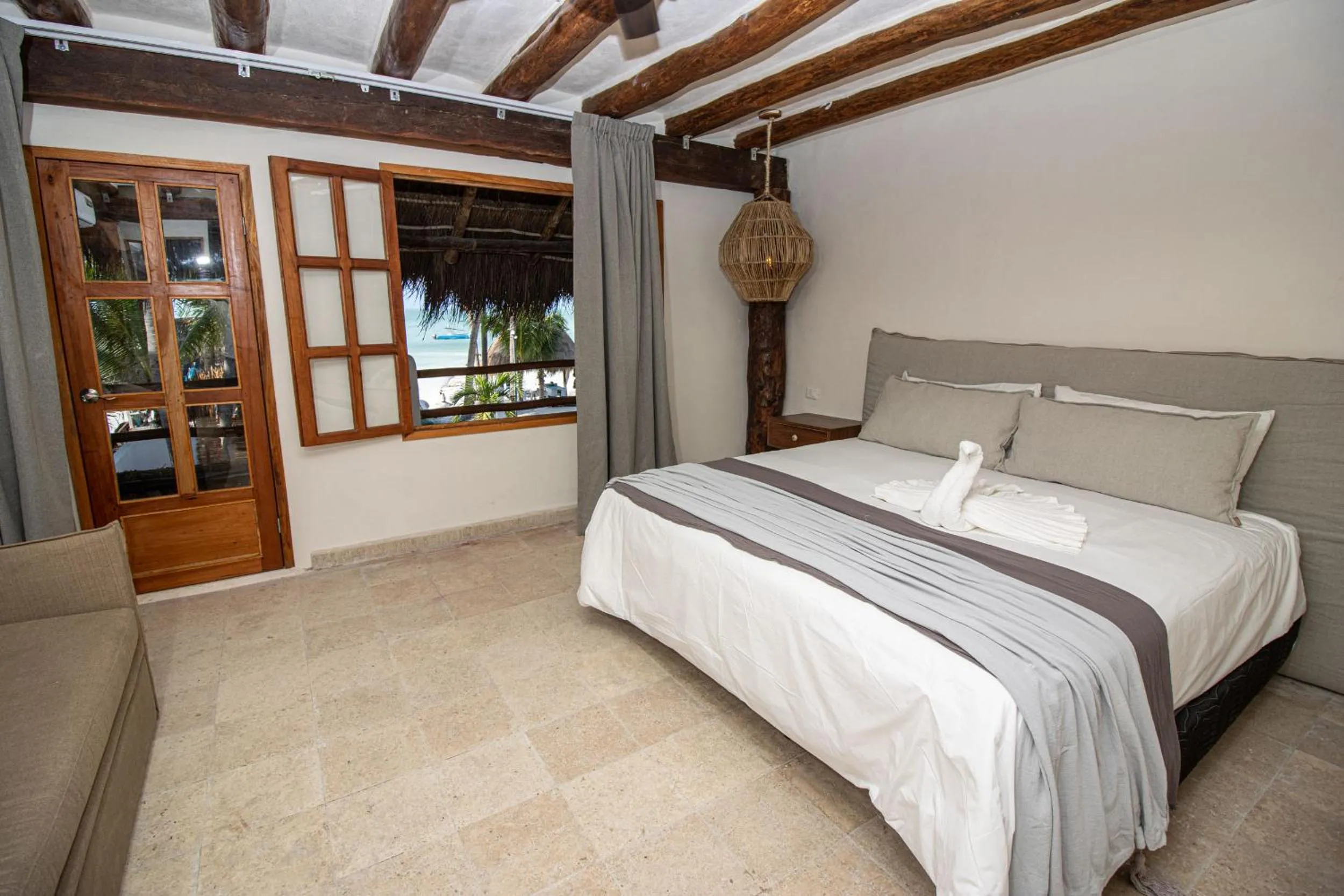 Bedroom, Bed in Amaite Holbox - Oceanfront Hotel
