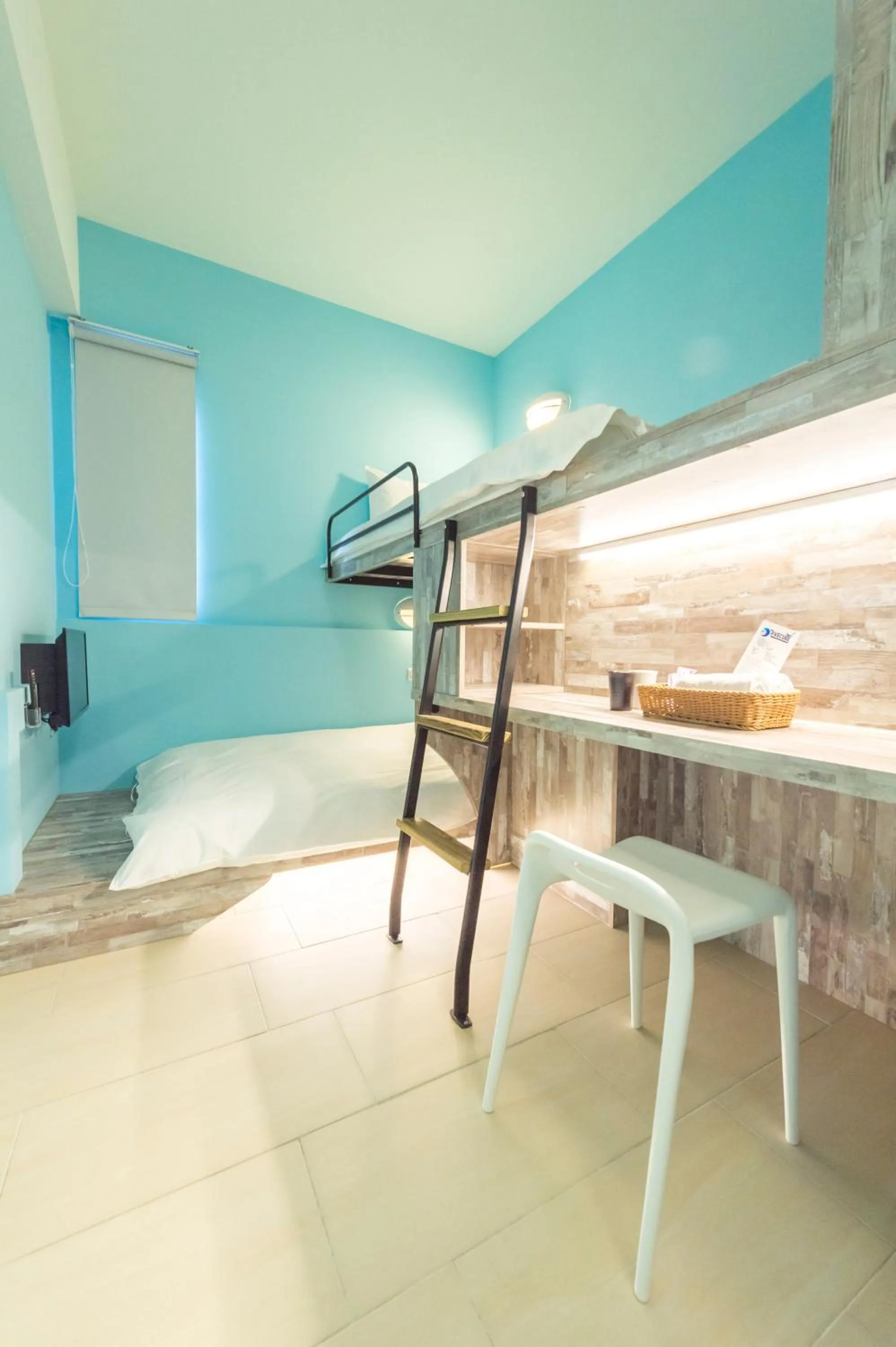 Bed in Divecube Hotel