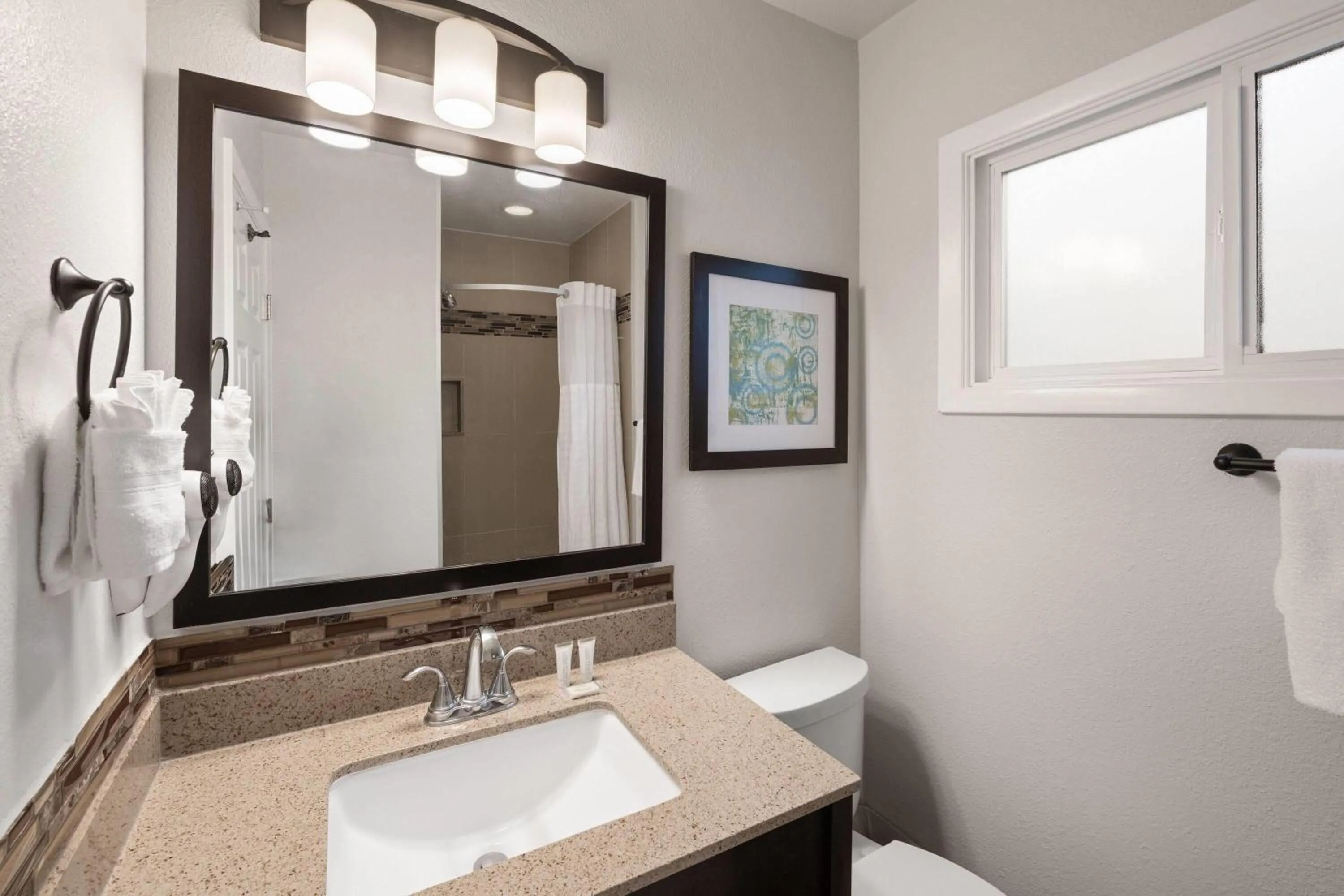 Bathroom in Days Inn by Wyndham Monterey Downtown