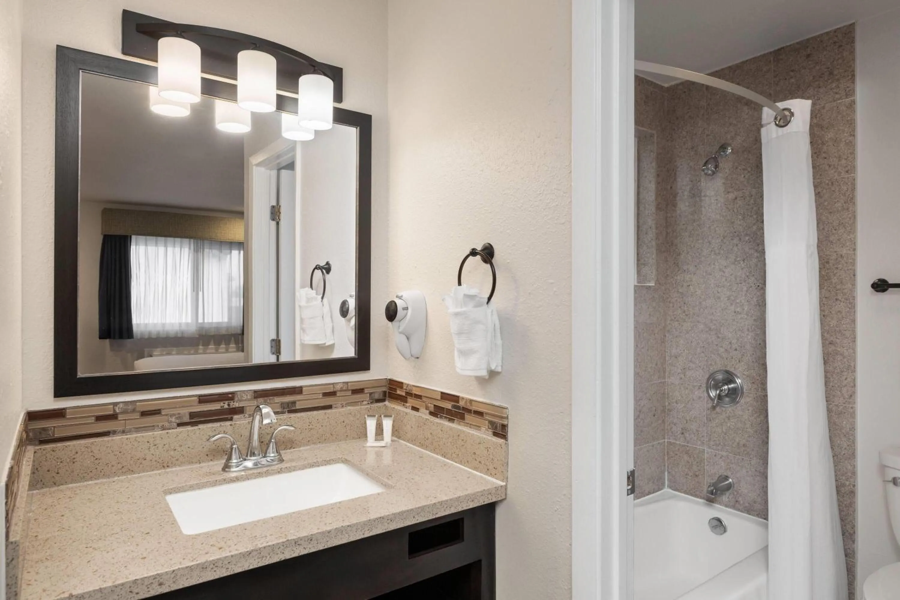 Bathroom in Days Inn by Wyndham Monterey Downtown