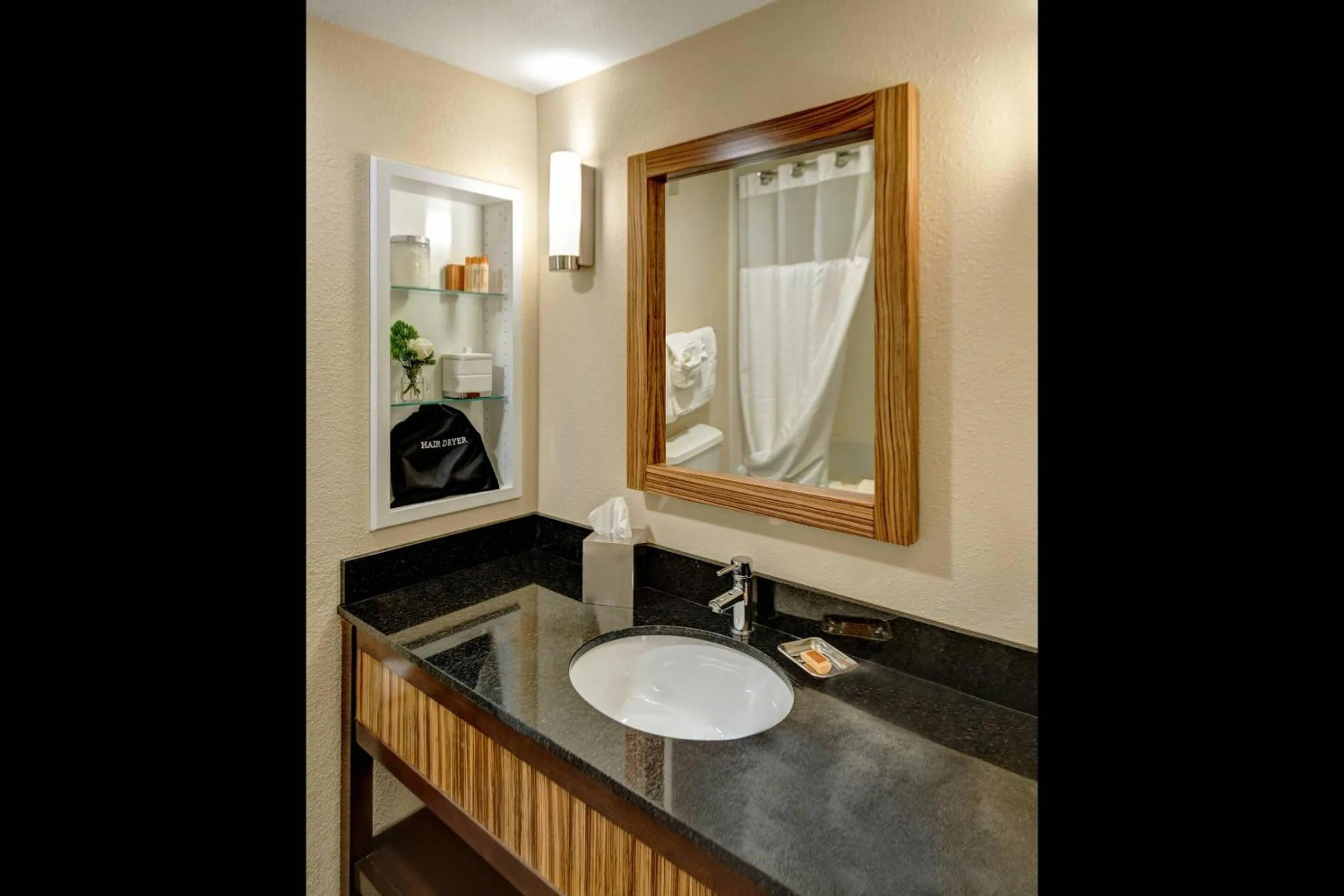 Bedroom in Garrison Hotel & Suites Dover-Portsmouth, an Ascend Collection Hotel