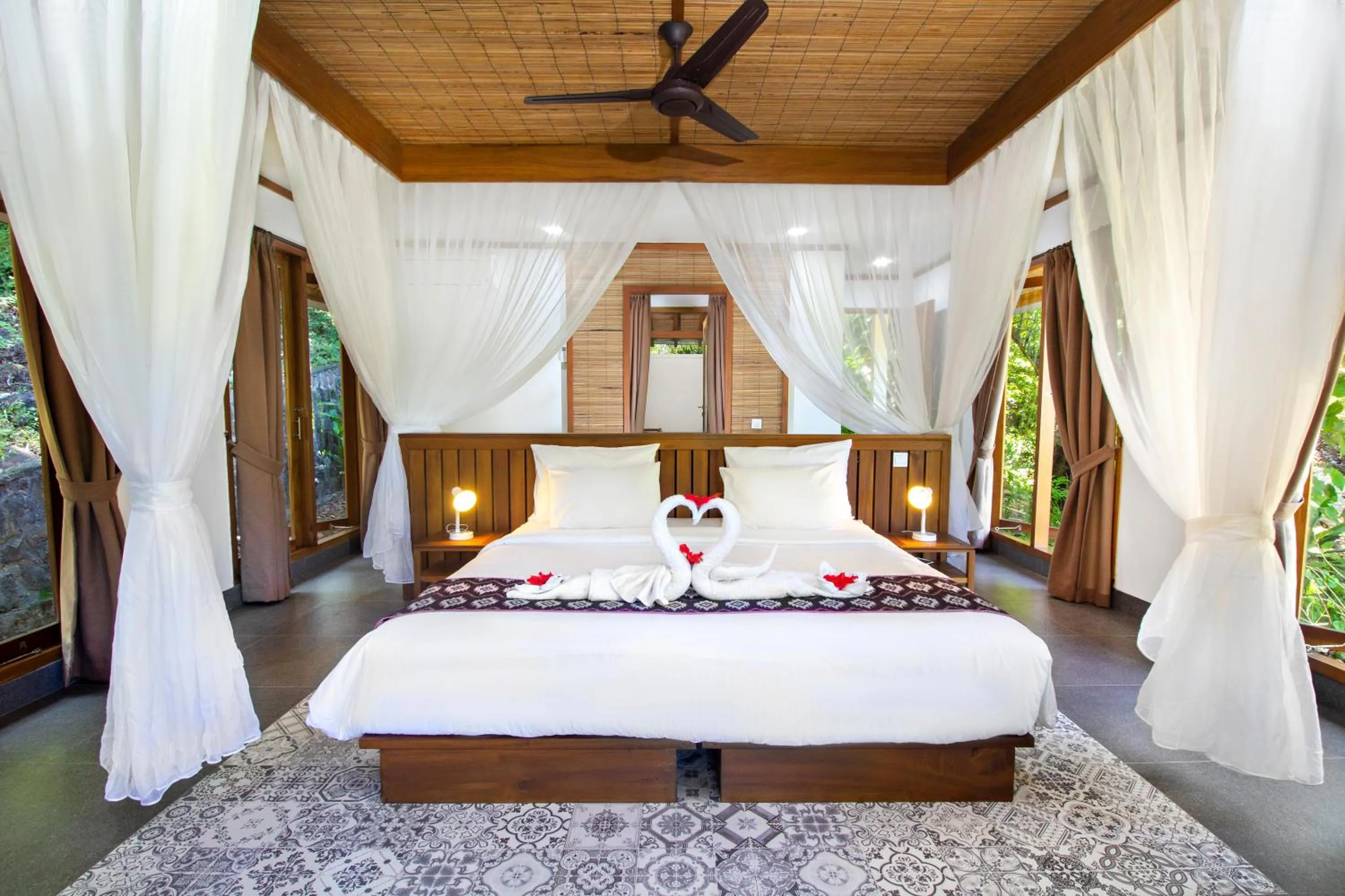 Bed in Murex Bangka Dive Resort