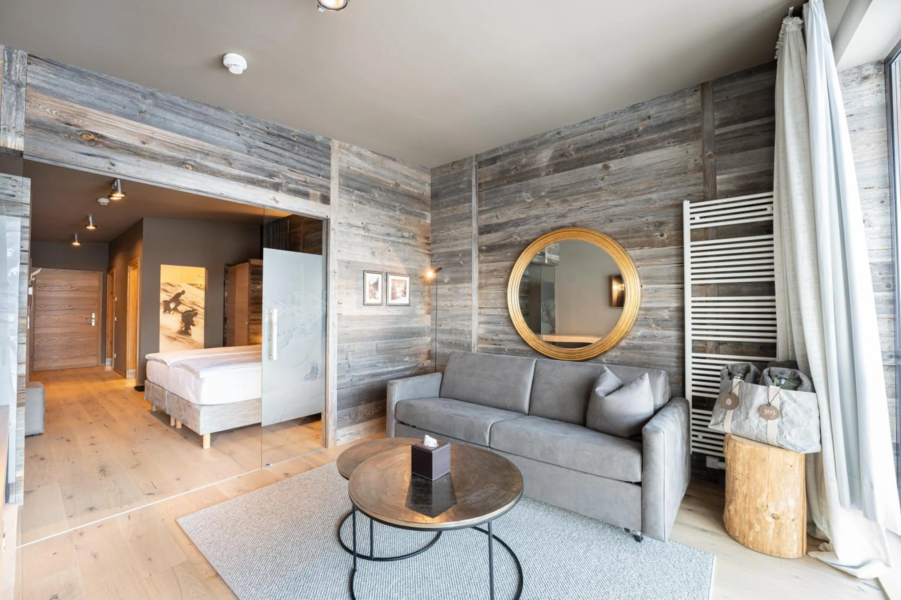 Living room, Bed in Das Kohlmayr Superior