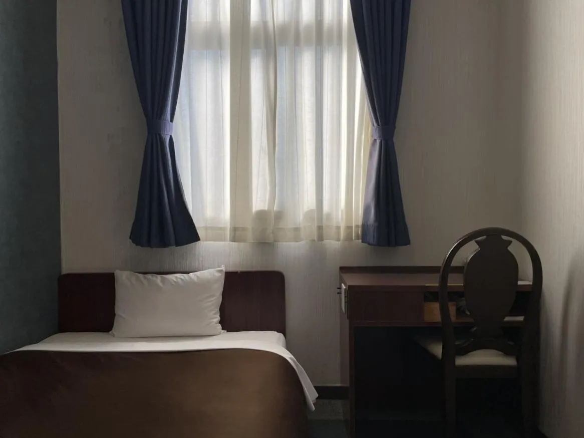 Photo of the whole room, Bed in Zentsuji Grand Hotel