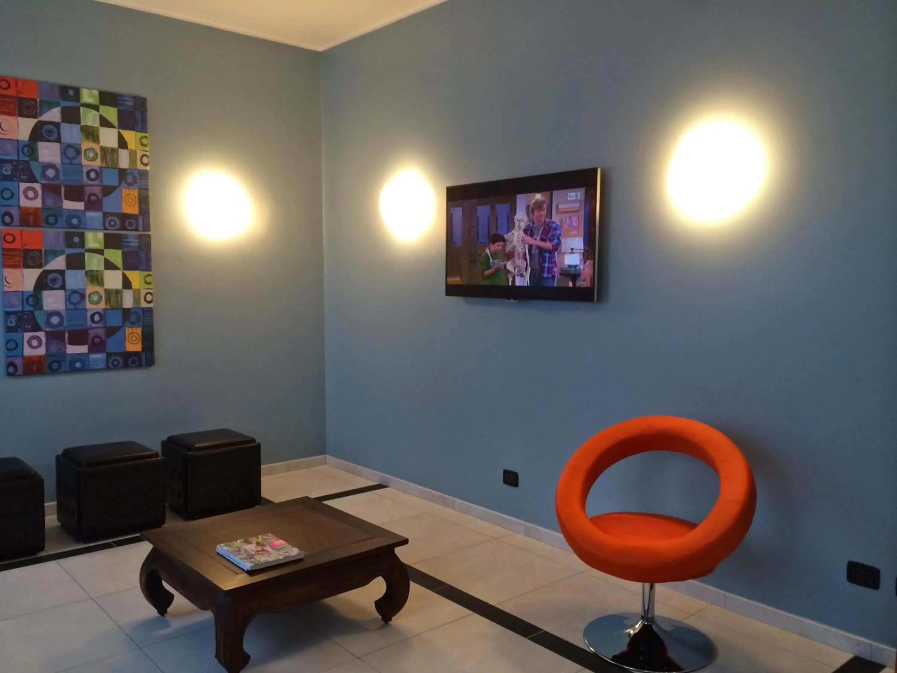 Communal lounge/ TV room in Hotel Arcobaleno