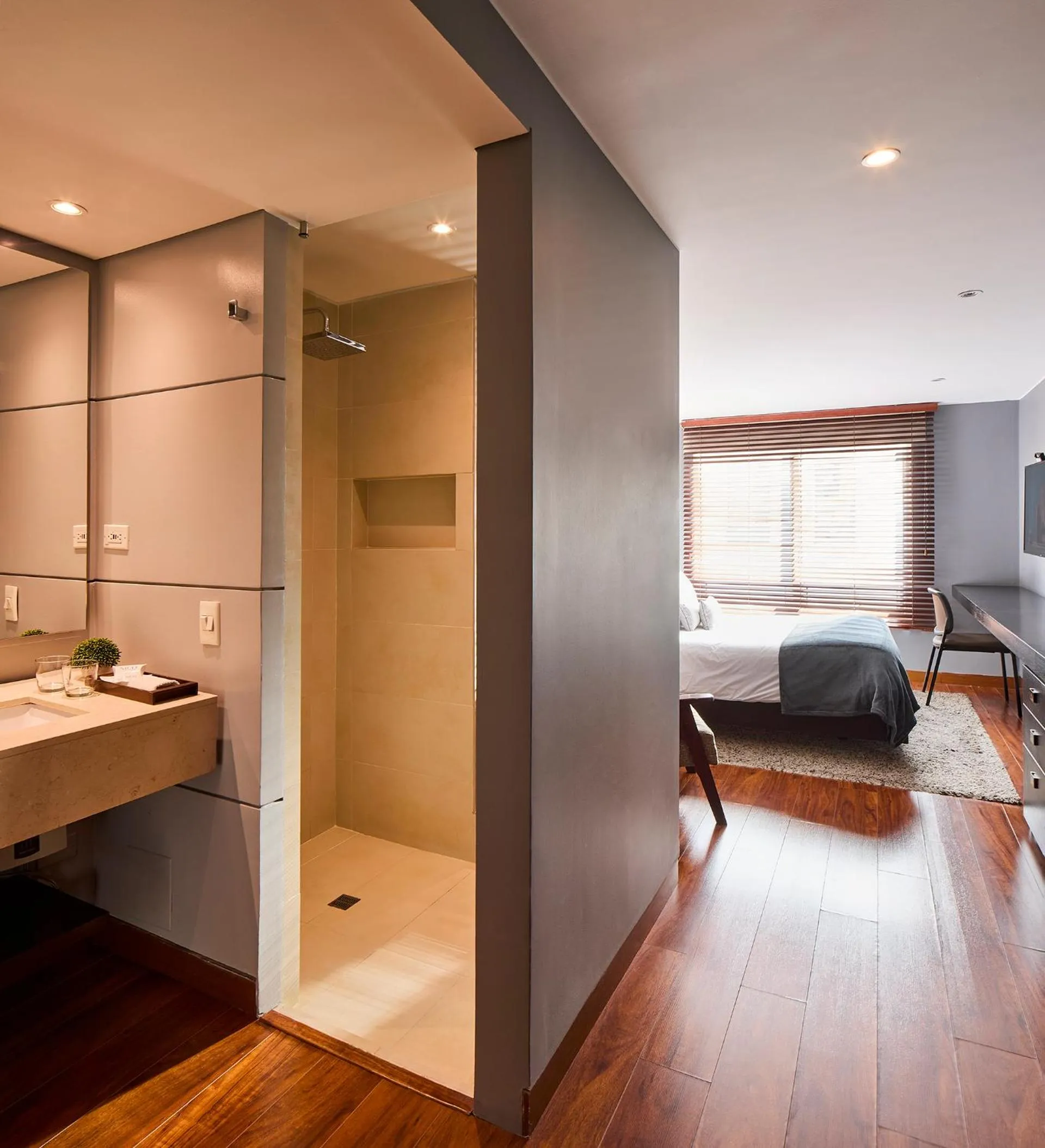 Bedroom in Nico Apartasuites