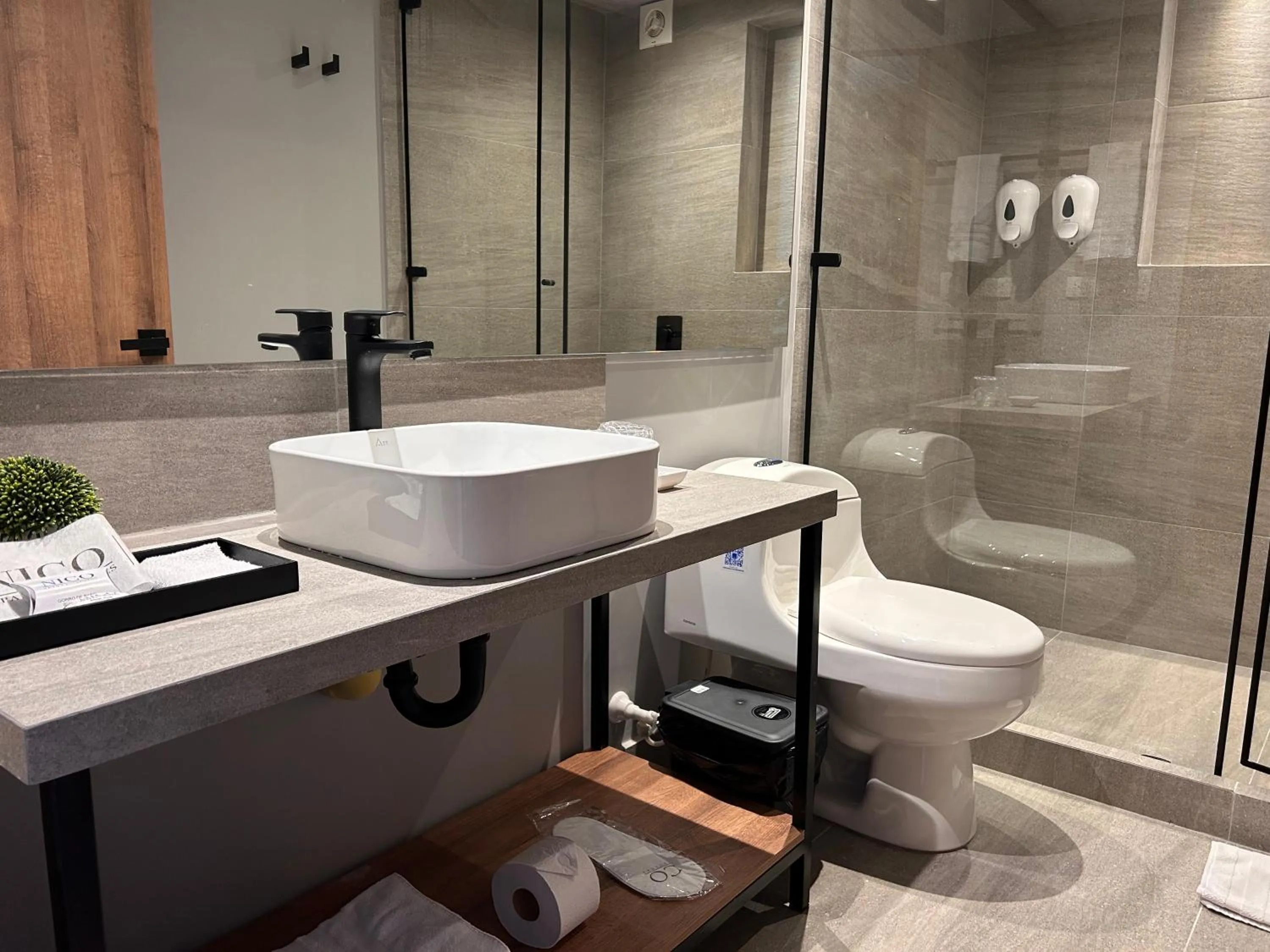 Bathroom in Nico Apartasuites